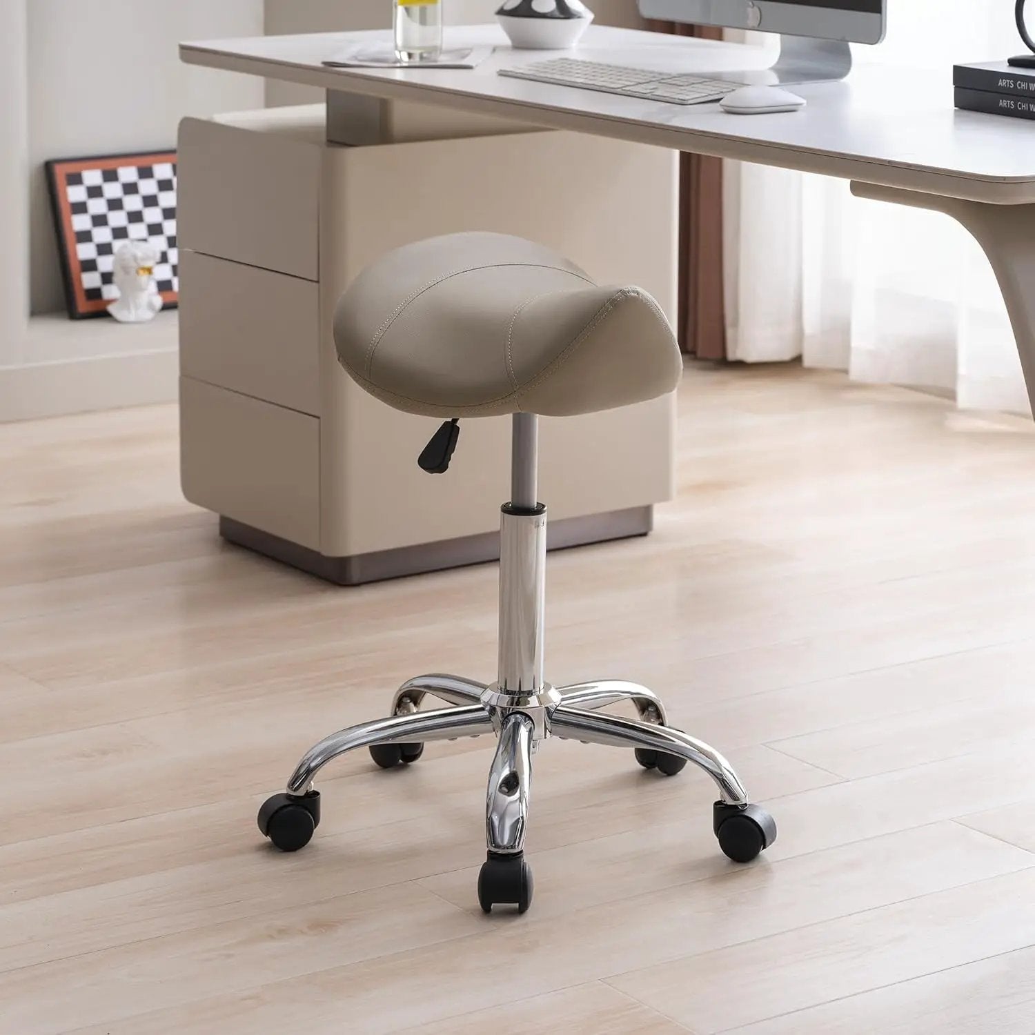 FIRAVOE Saddle Stool with wheels, adjustable 18–26 in, light grey faux leather with chrome base for office use