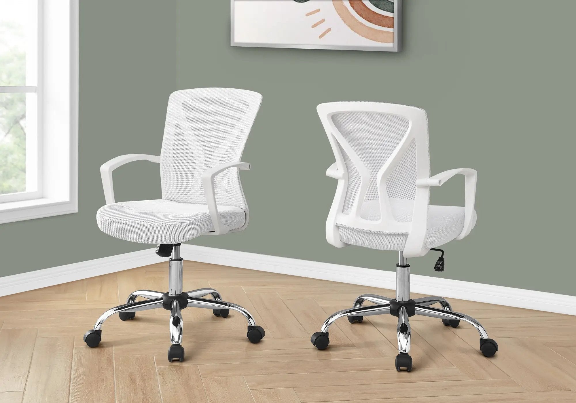 Two white mesh office chairs with chrome bases and armrests.