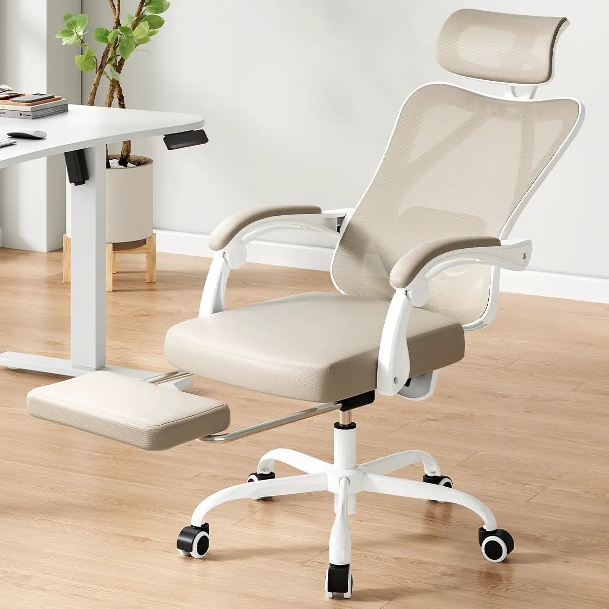 White and khaki ergonomic office chair with mesh design, headrest, adjustable lumbar support, and footrest for home and study use.