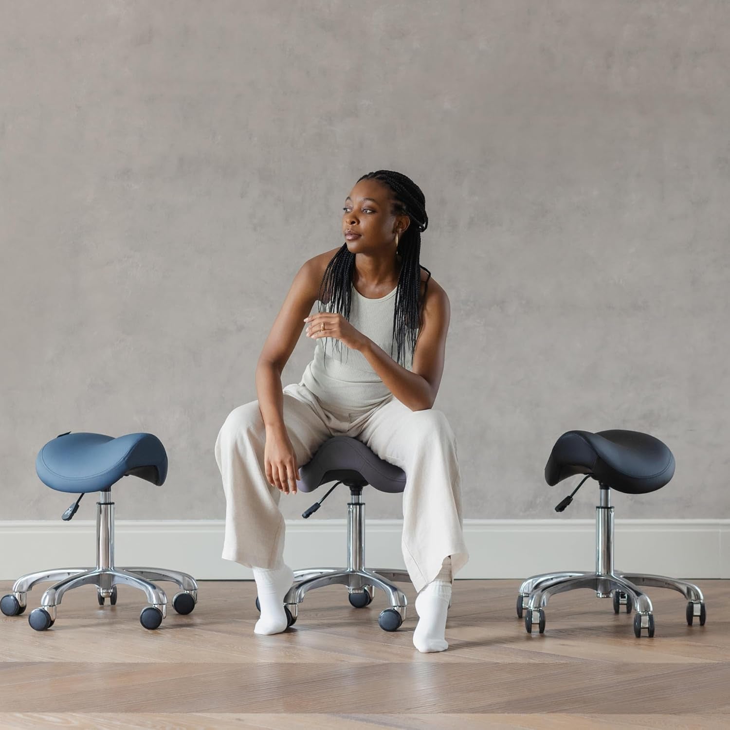 Haku 506 Series ergonomic saddle stools with wheels; violet, 3 stools shown, S&Y Furniture
