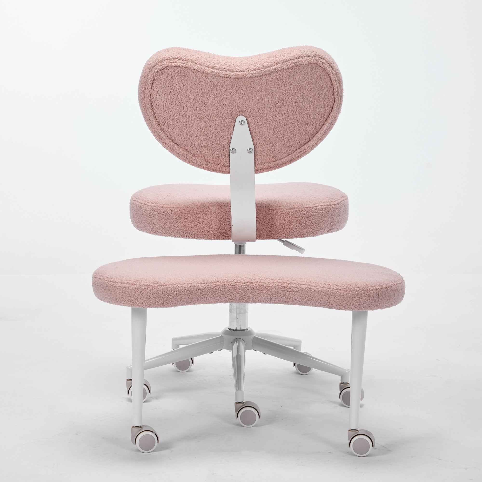 Pink cross-legged meditation chair on wheels with heart-shaped backrest and lumbar support.