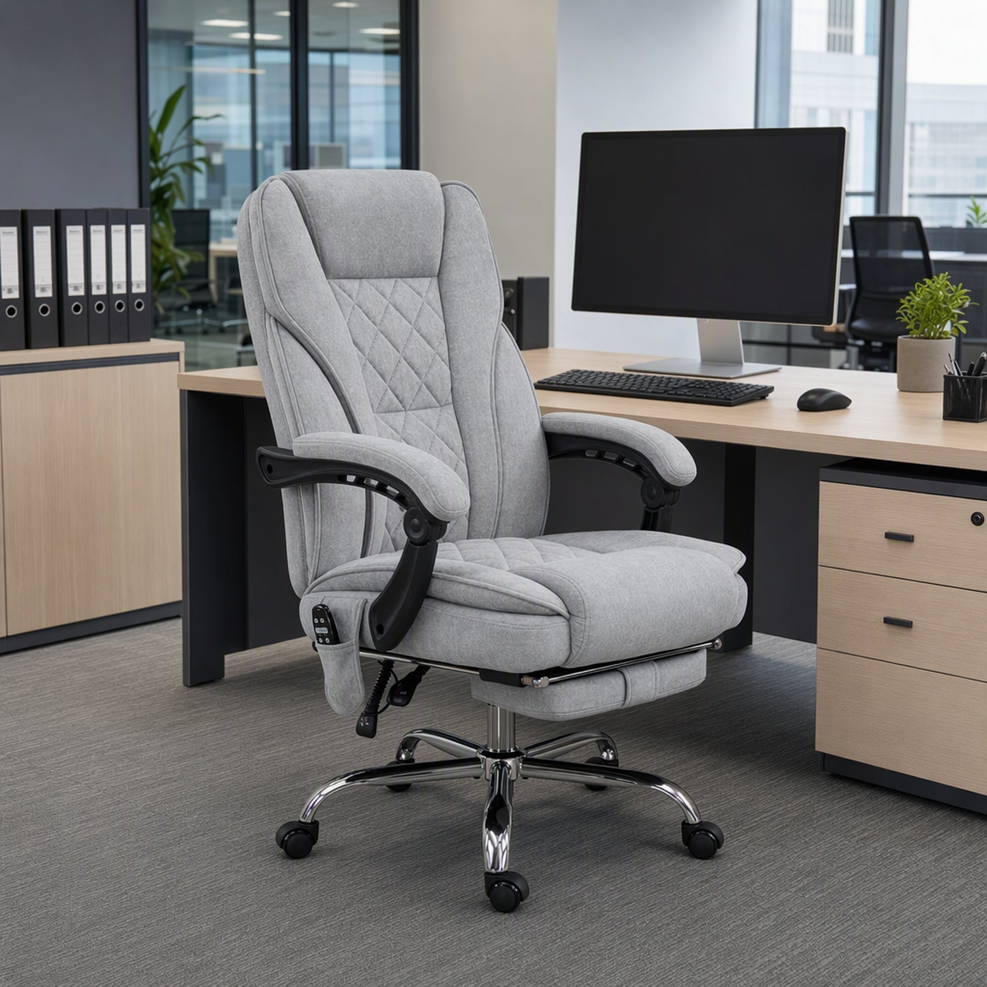 Gray massage office chair at a desk in a home office