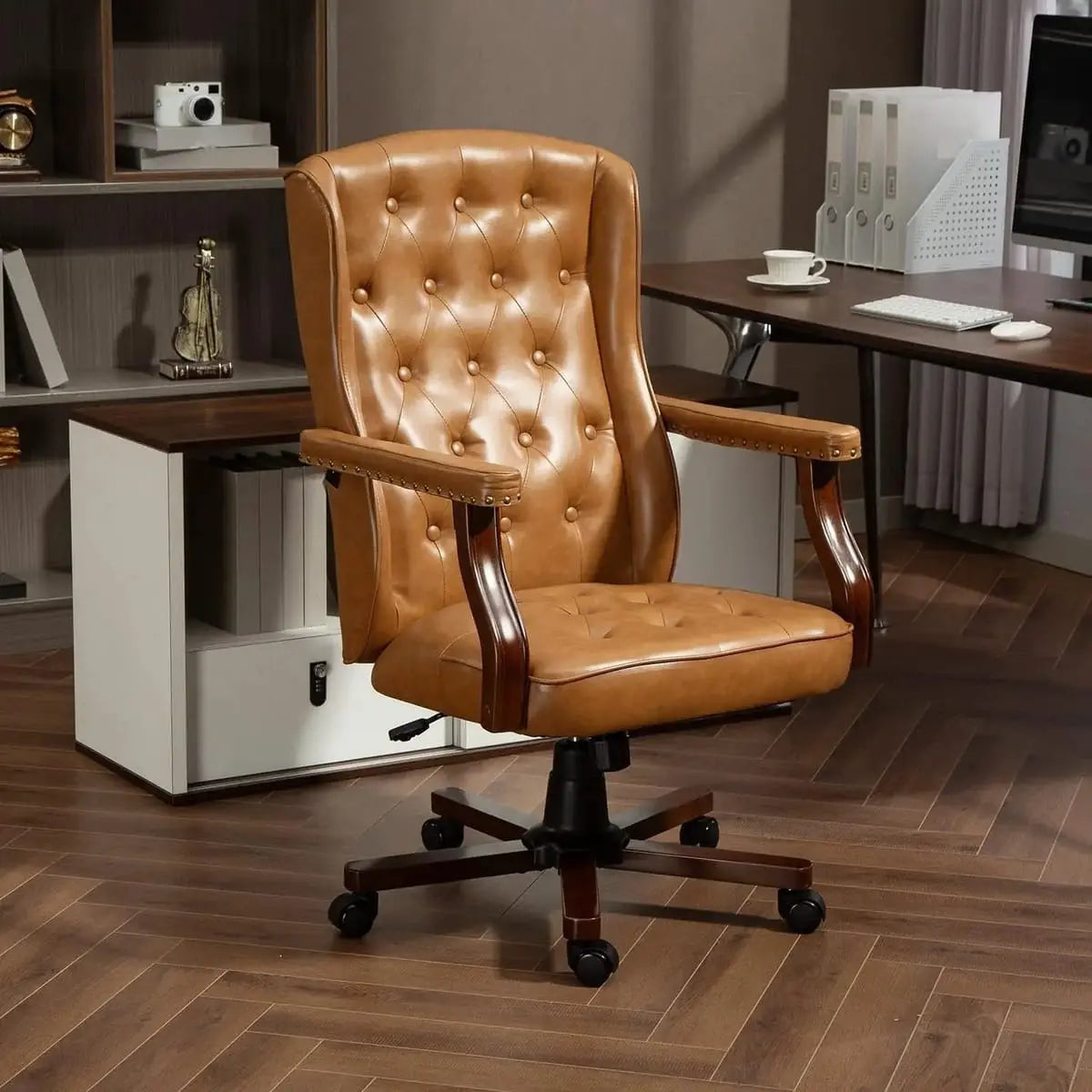 Brown vintage tufted faux leather ergonomic executive office chair from ADS, with swivel base and banker-style design.