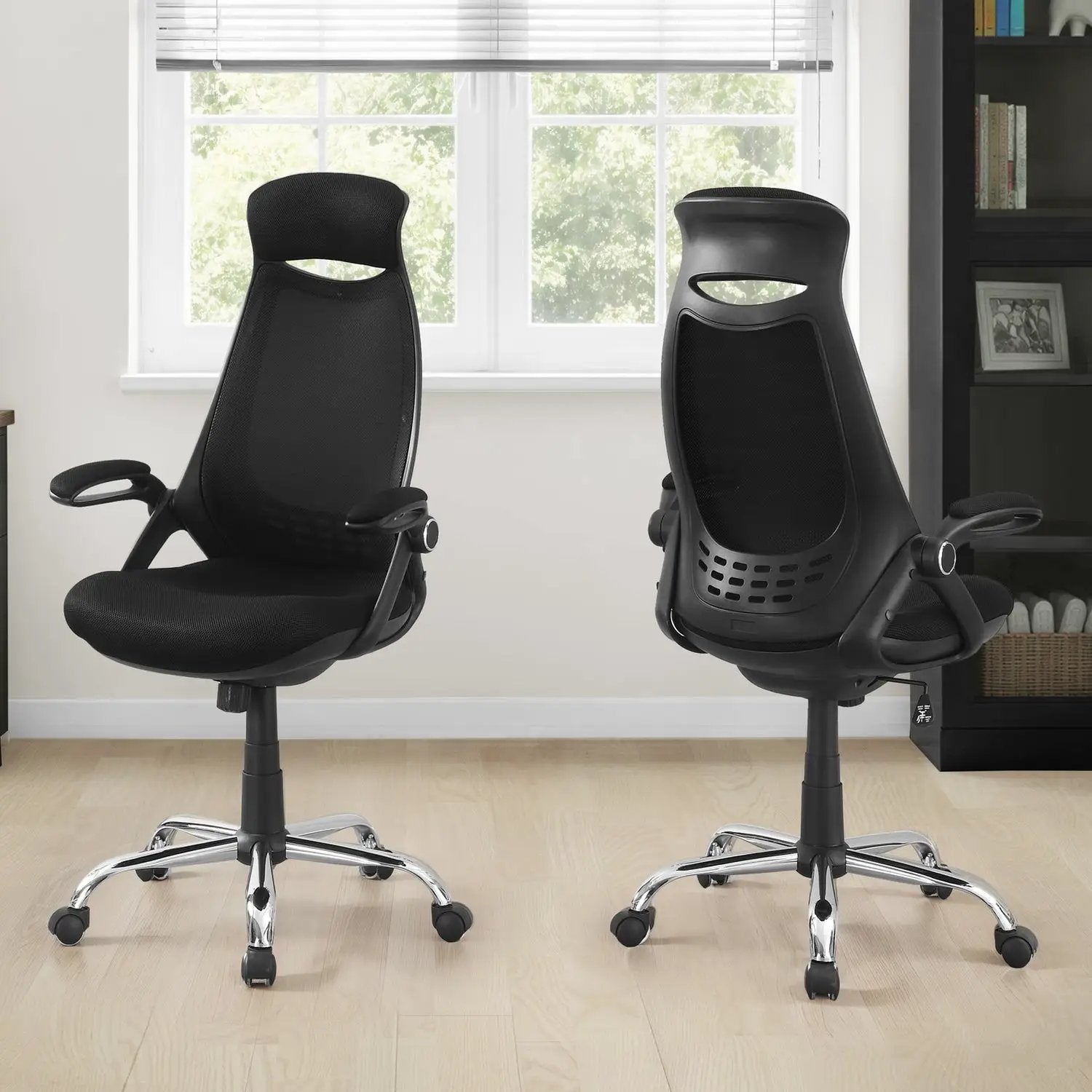 Contemporary black mesh office chair pair with ergonomic backs, armrests and chrome bases.