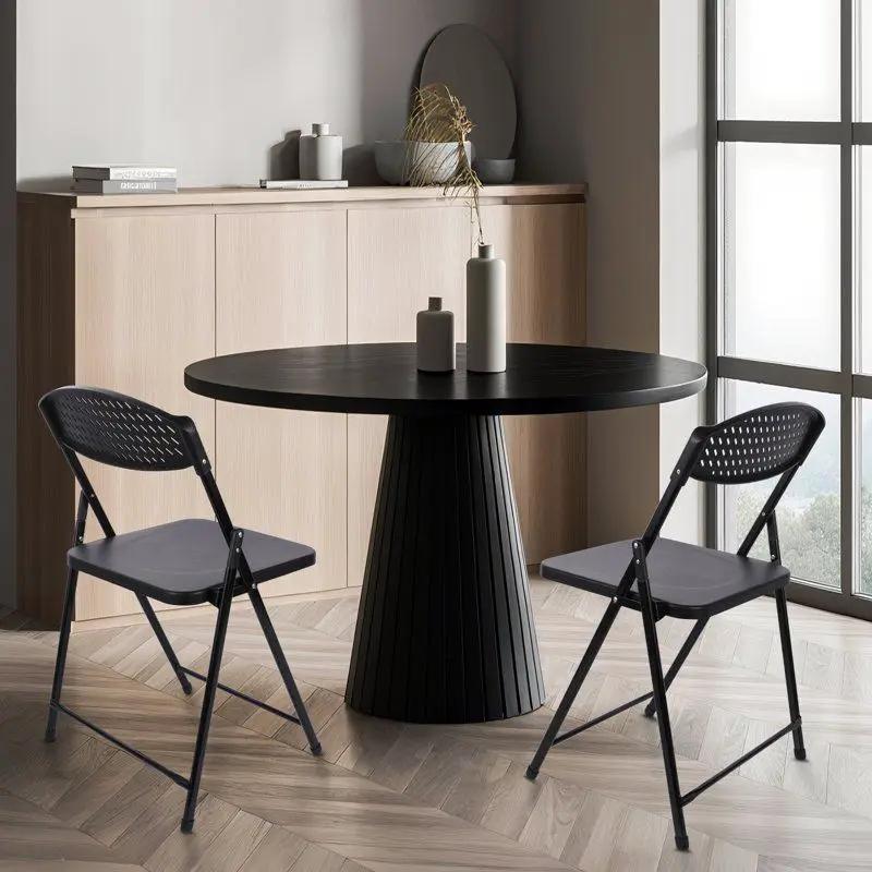 Set of 10 Doba heavy-duty steel folding chairs, compact and durable for events, with sturdy frames and comfortable seats.