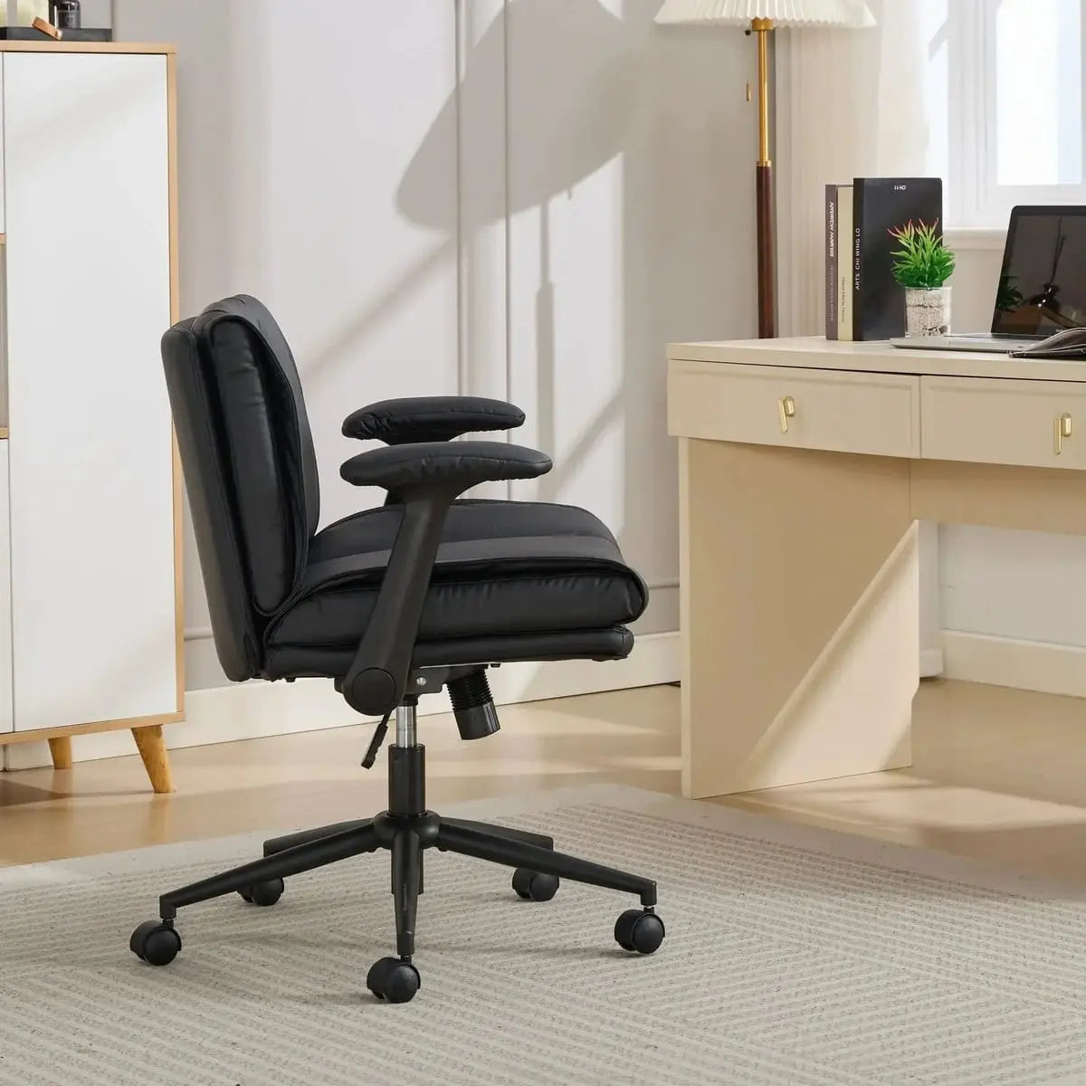 Doba ergonomic black leather cross-legged chair with adjustable flip-up armrests and metal frame, modern and comfortable seating.