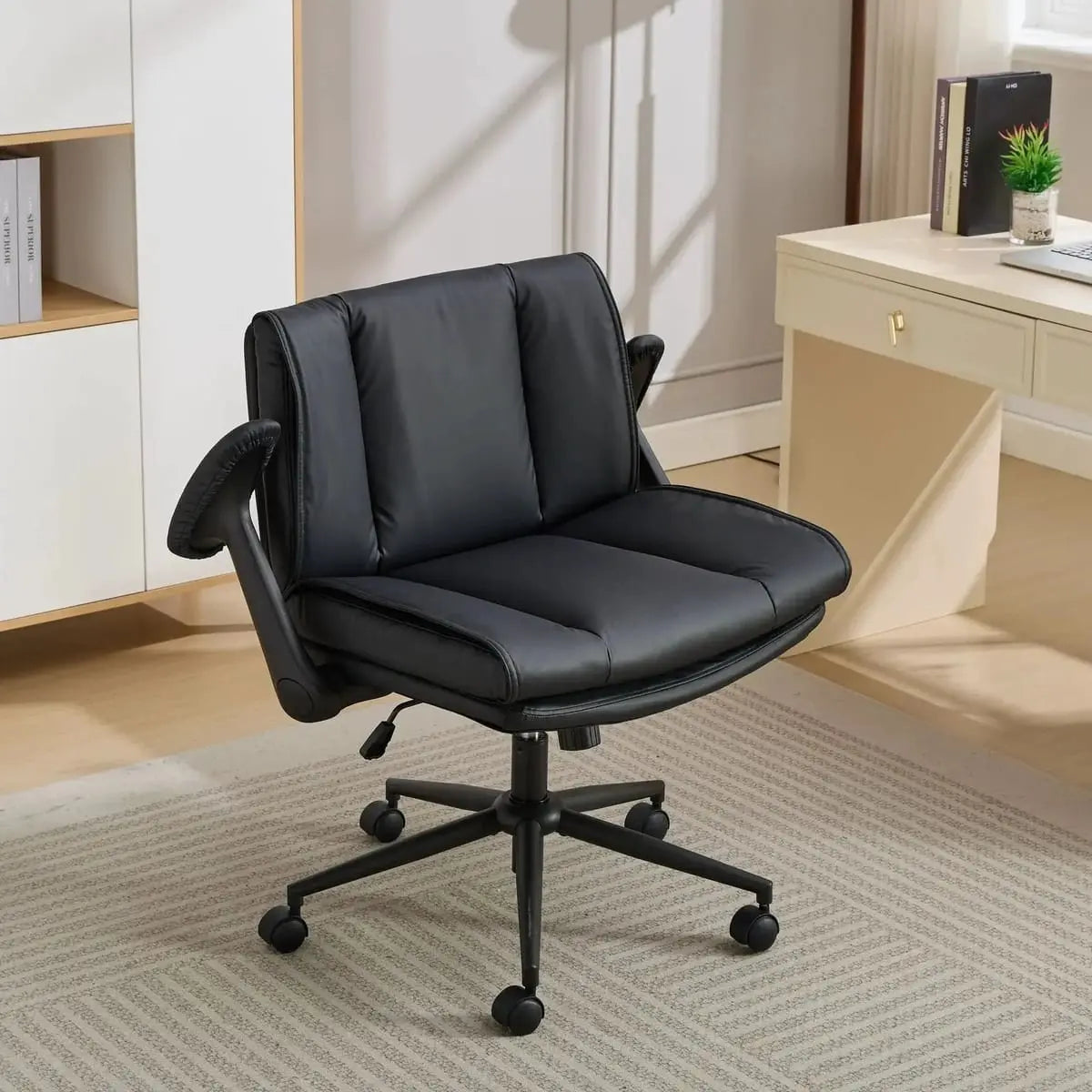 Doba ergonomic leather cross-legged chair with black metal frame, adjustable flip-up armrests and cushioned seat for comfort and support