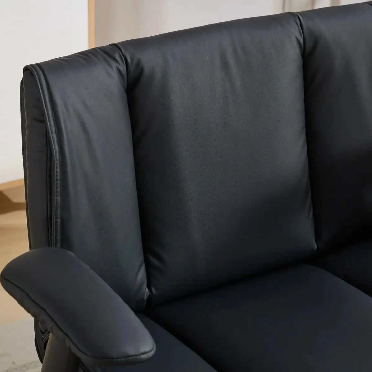 Black leather ergonomic cross-legged chair by Doba with adjustable flip-up armrests and black metal frame.