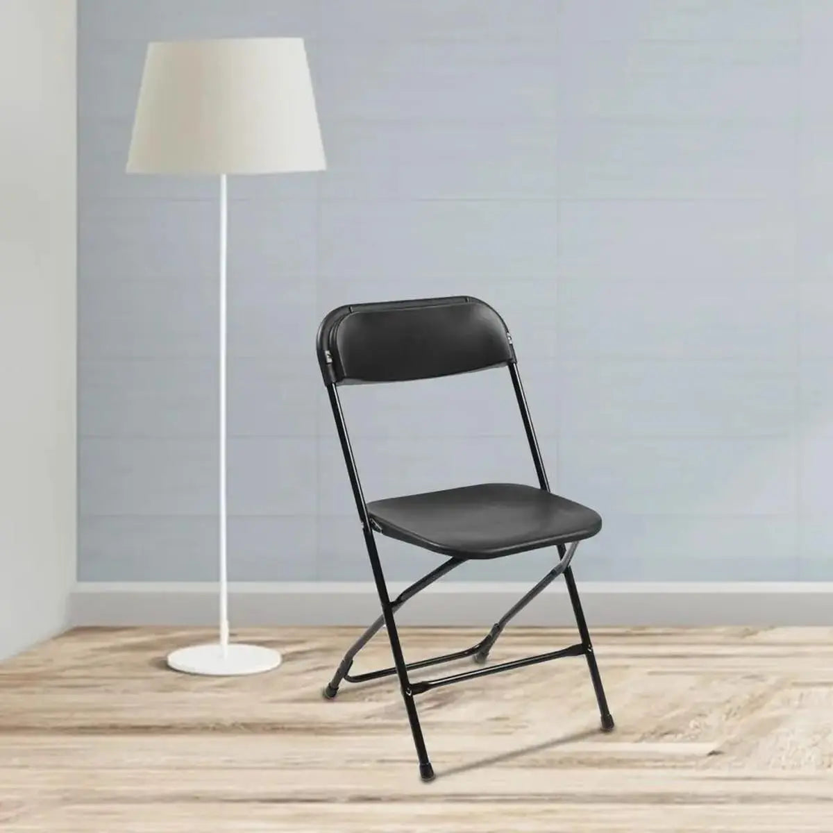 Black Doba Plasti heavy-duty folding chair with 350 lb capacity, weatherproof and durable for outdoor and indoor use.