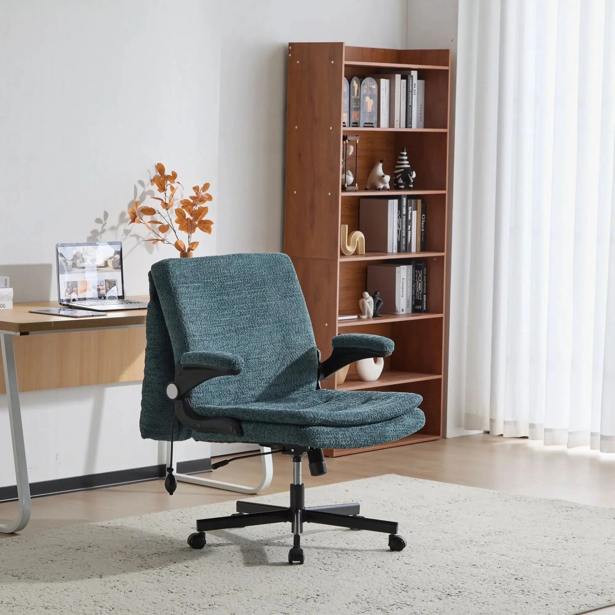 Doba ergonomic dark green office chair with criss cross design, airbag lumbar support, wide 25-inch seat, and adjustable flip-up armrests.