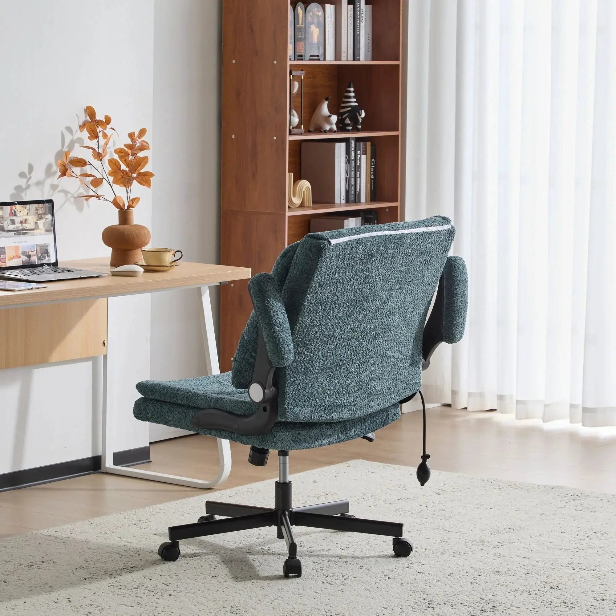 Doba ergonomic dark green office chair with criss-cross design, airbag lumbar support, 25-inch seat, and adjustable flip-up armrests.