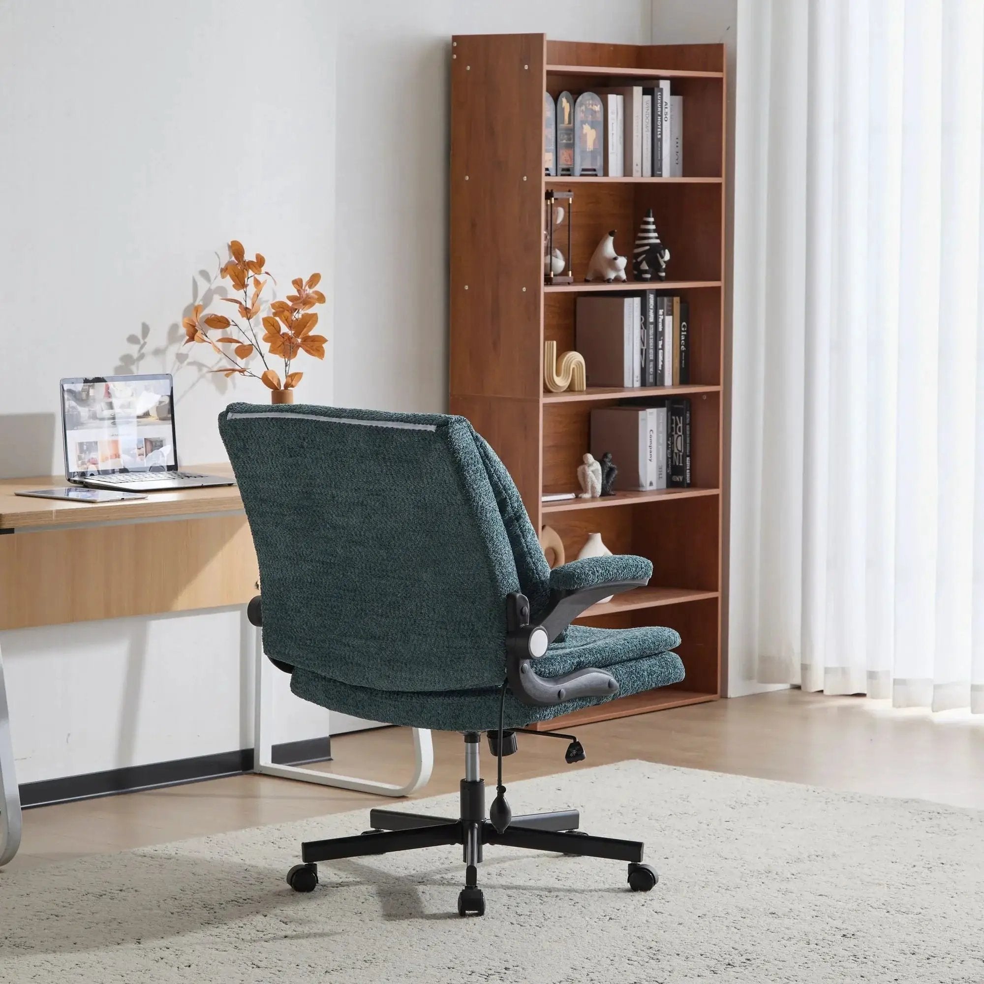 Doba ergonomic dark green office chair with criss cross design, airbag lumbar support, 25-inch seat, and adjustable flip-up armrests.