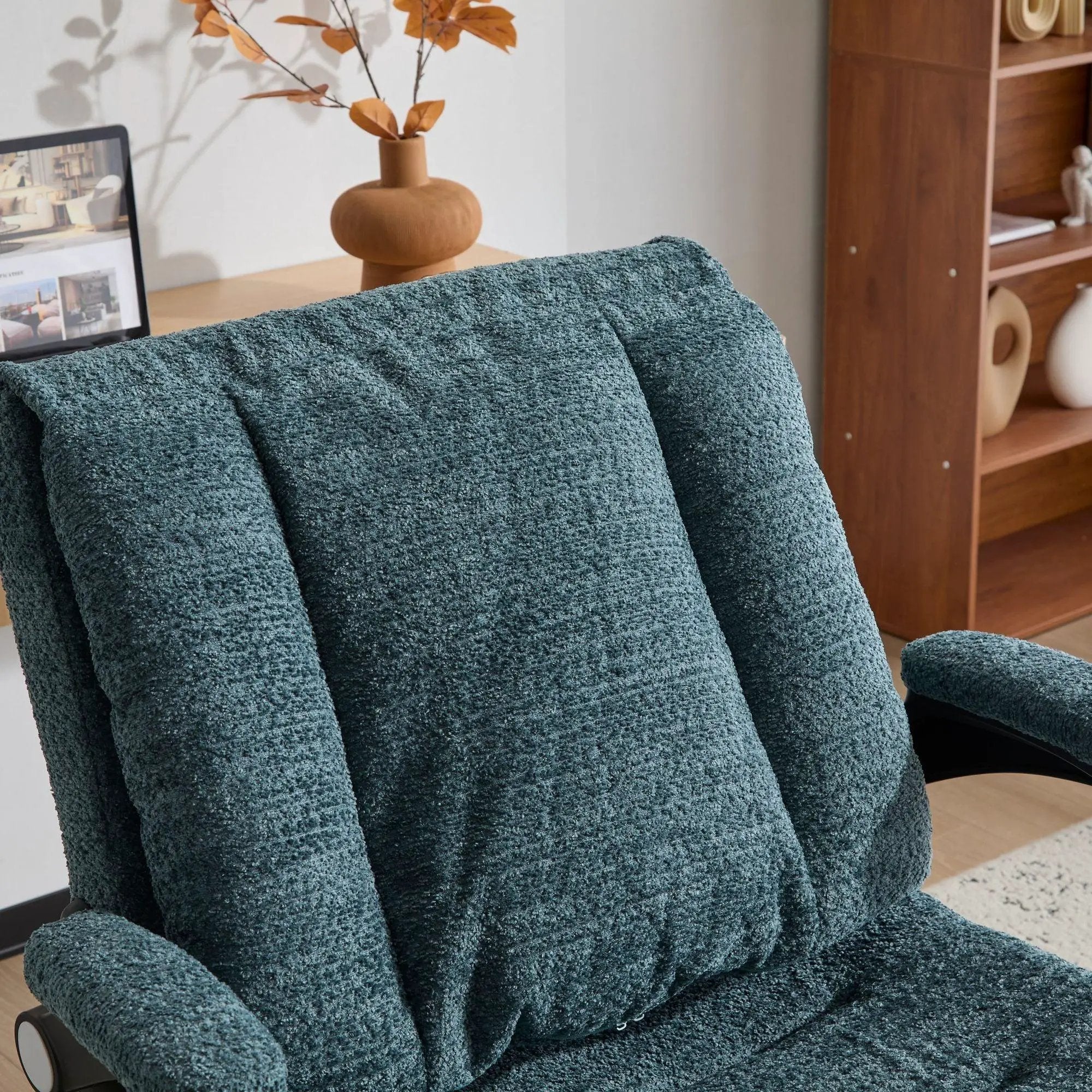 Doba ergonomic dark green office chair with criss-cross design, airbag lumbar support, 25-inch seat, and adjustable flip-up armrests.