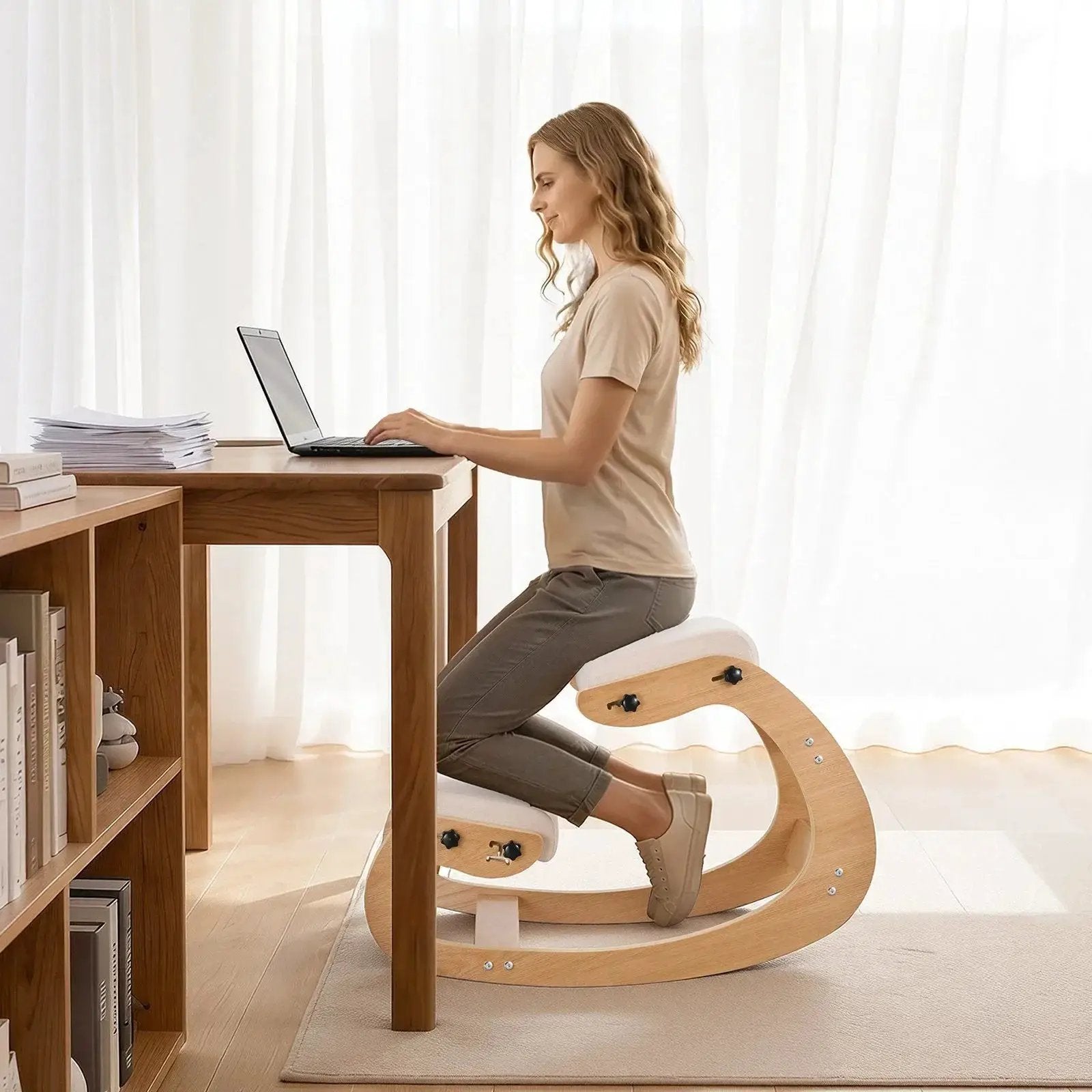 Beige ergonomic kneeling chair with wooden frame and adjustable height by Doba, designed for ergonomic comfort and support.