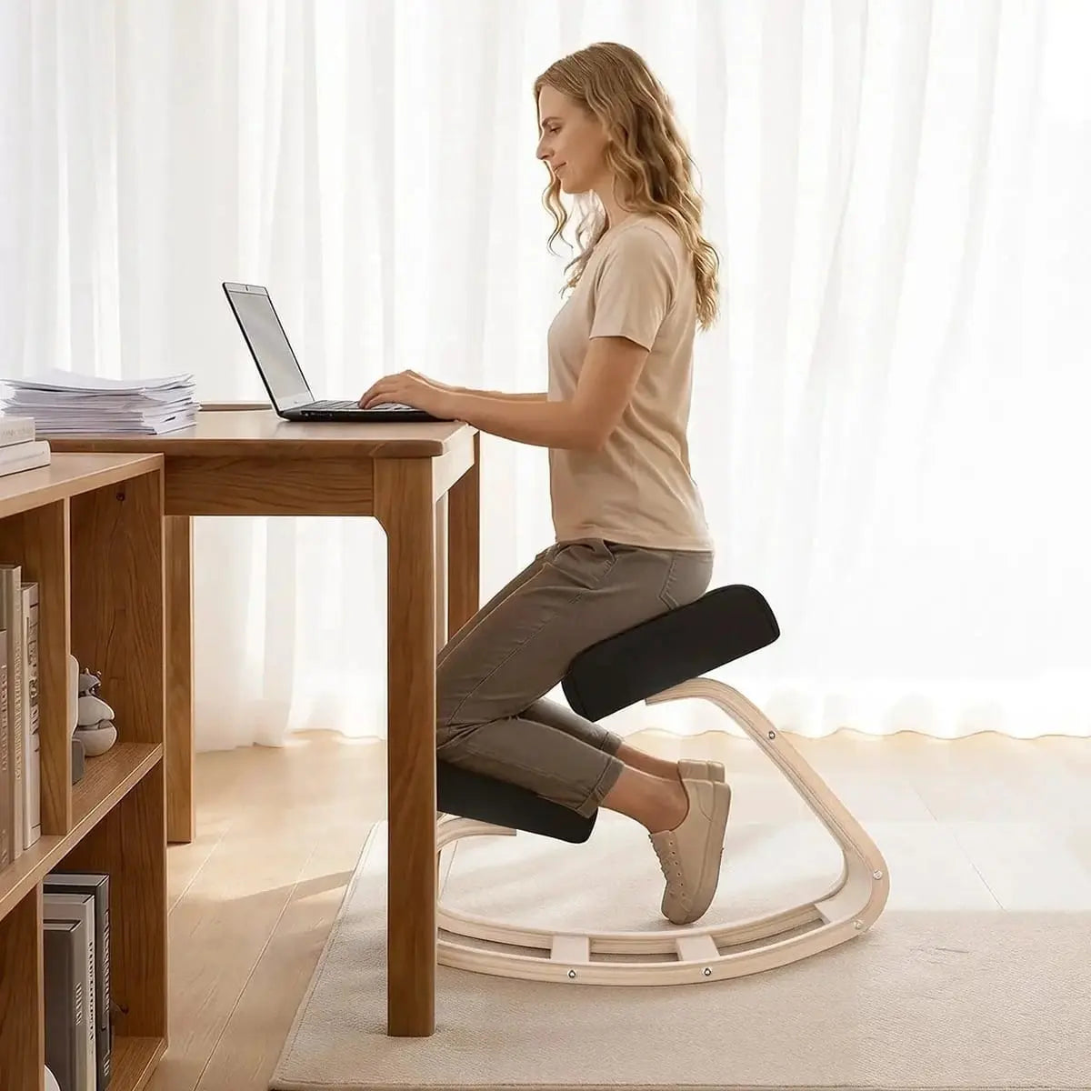 Doba ergonomic kneeling desk chair with cushioned seat and wood frame, designed to improve posture and relieve back pain.