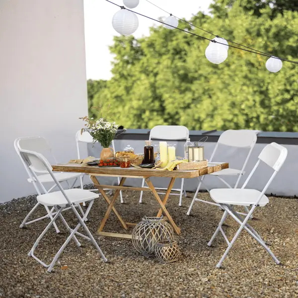 Doba white plastic folding chair with sturdy frame, suitable for indoor or outdoor events, supports up to 350 lbs, ideal for parties and home use.