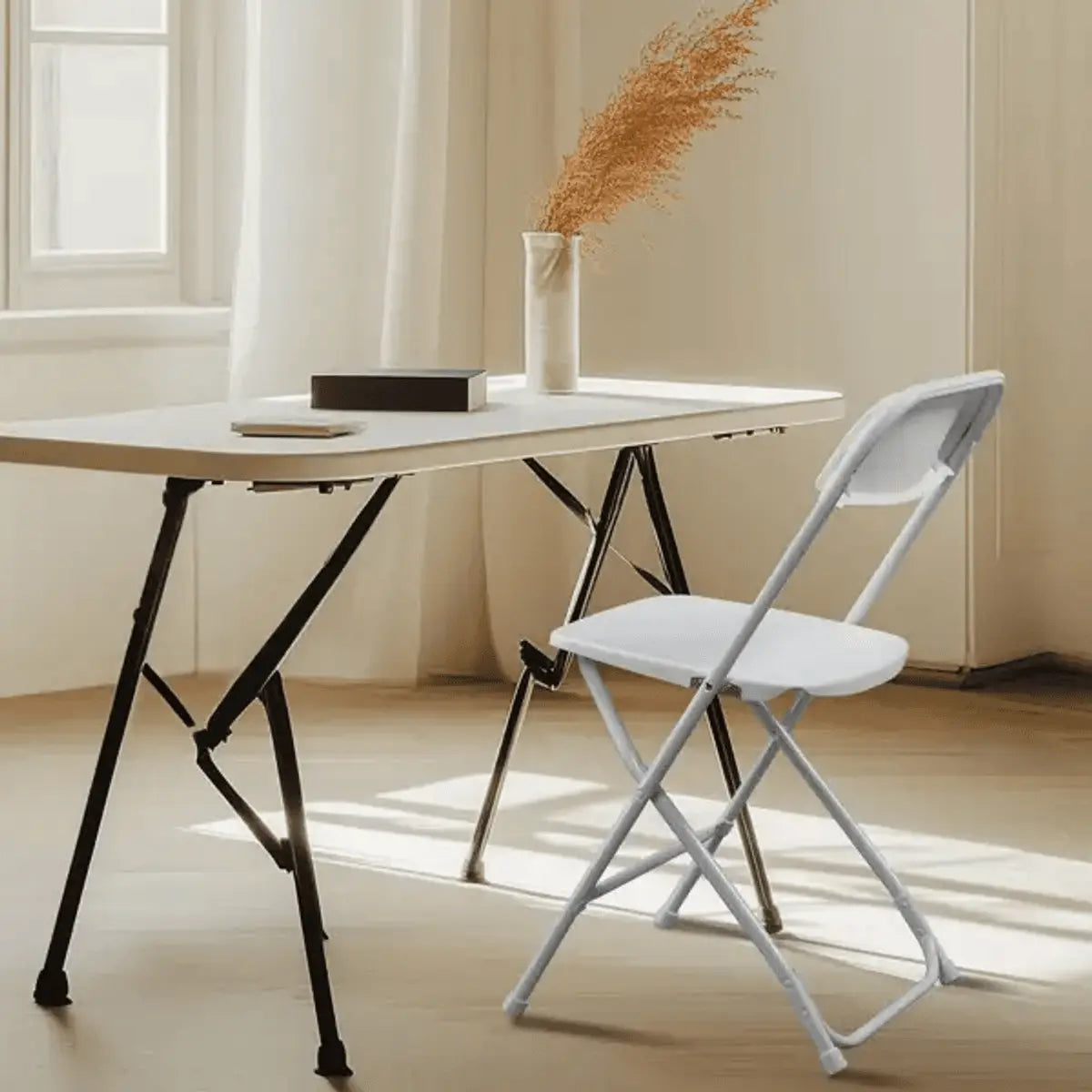 White plastic folding chair by Doba, heavy-duty design with 350 lb capacity, suitable for indoor and outdoor events or home use.