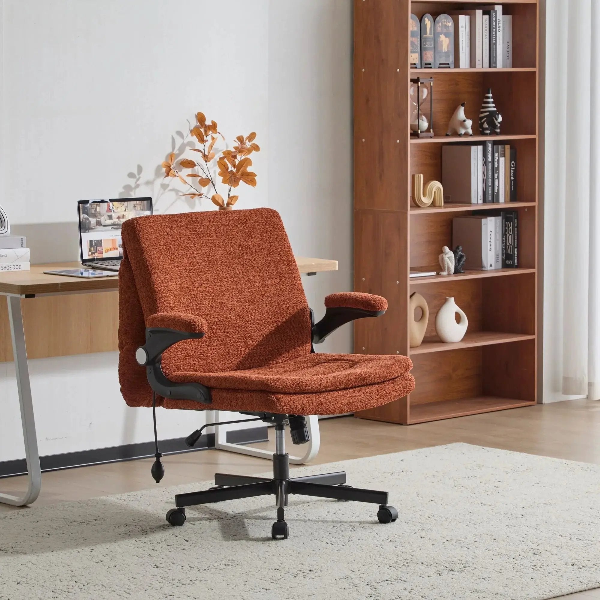 Doba premium ergonomic criss-cross desk chair with orange nylon upholstery, flip-up back and adjustable arms.