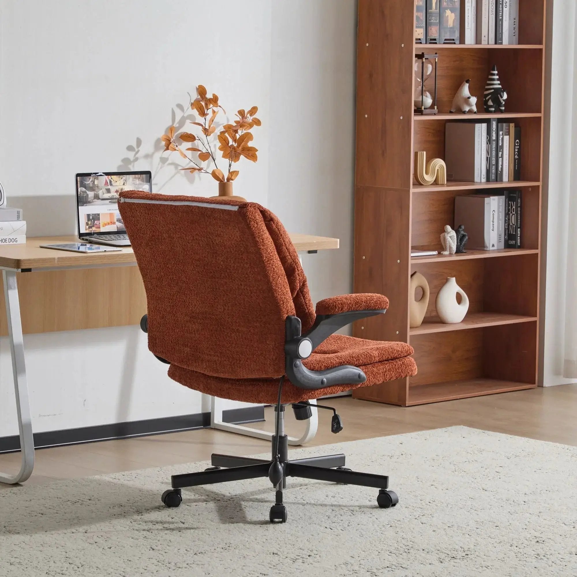 Doba premium ergonomic criss-cross desk chair with flip-up back and arms, orange nylon upholstery, adjustable support.