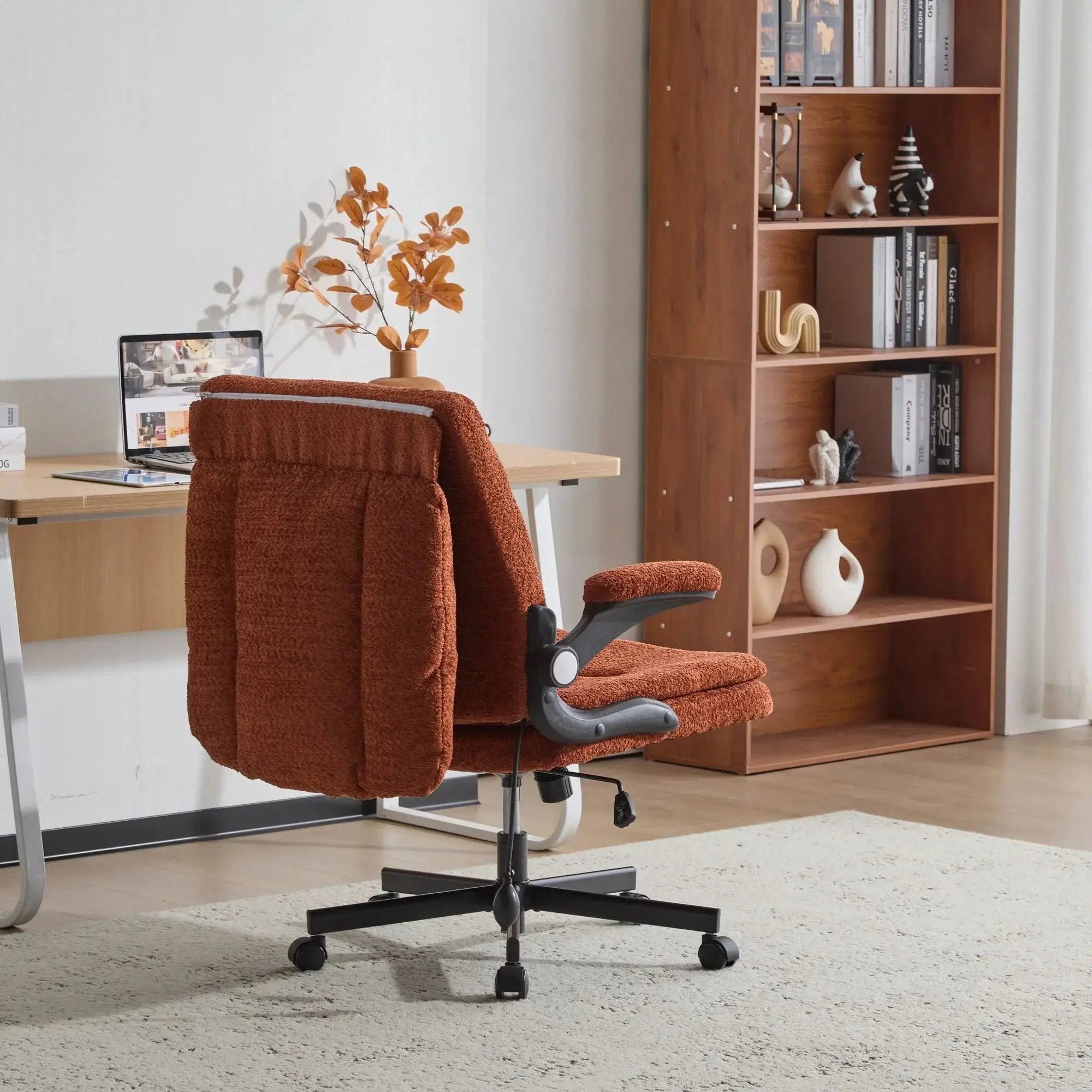 Doba premium ergonomic criss-cross desk chair with orange nylon upholstery, flip-up back, and adjustable arms.