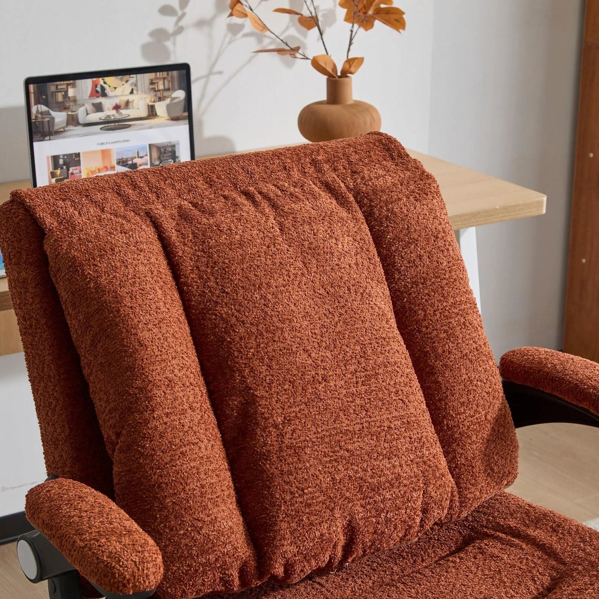Orange Doba ergonomic criss cross desk chair with flip-up back and arms, featuring nylon upholstery and adjustable design.
