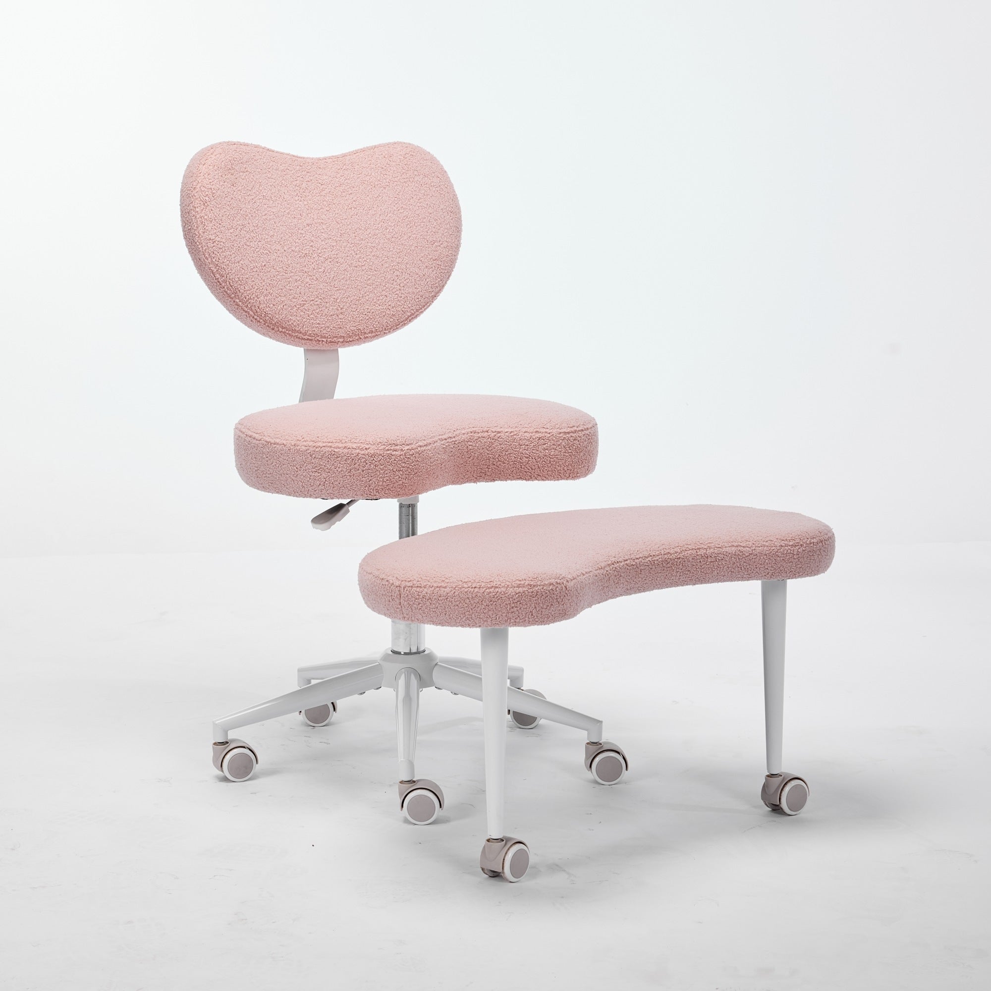Pink cross-legged meditation chair with wheels and footrest, white frame, soft textured fabric, lumbar support