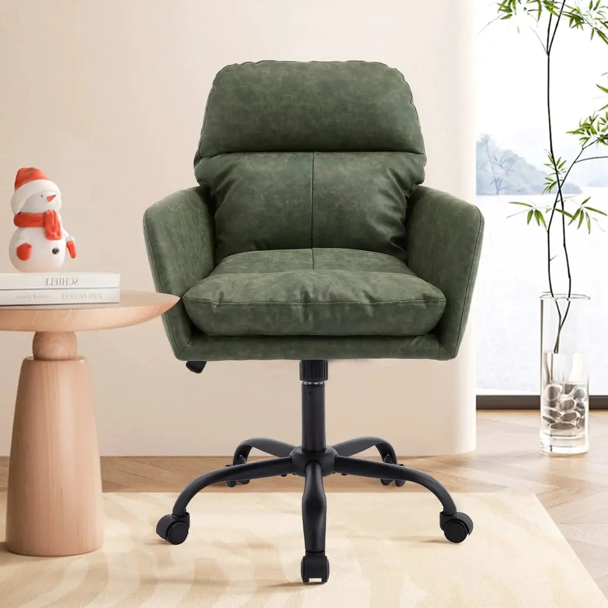 Green PU leather office task chair with adjustable height, sturdy metal frame, and ergonomic design for office use.