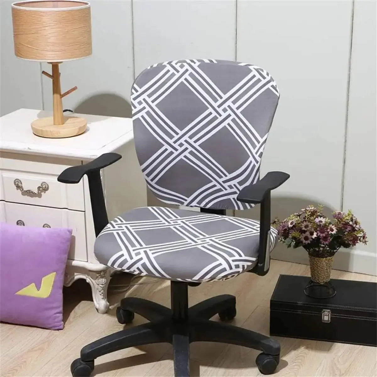 Melaluxe stretchable universal office chair cover on a small chair, featuring a colorful design and snug fit for small office chairs.