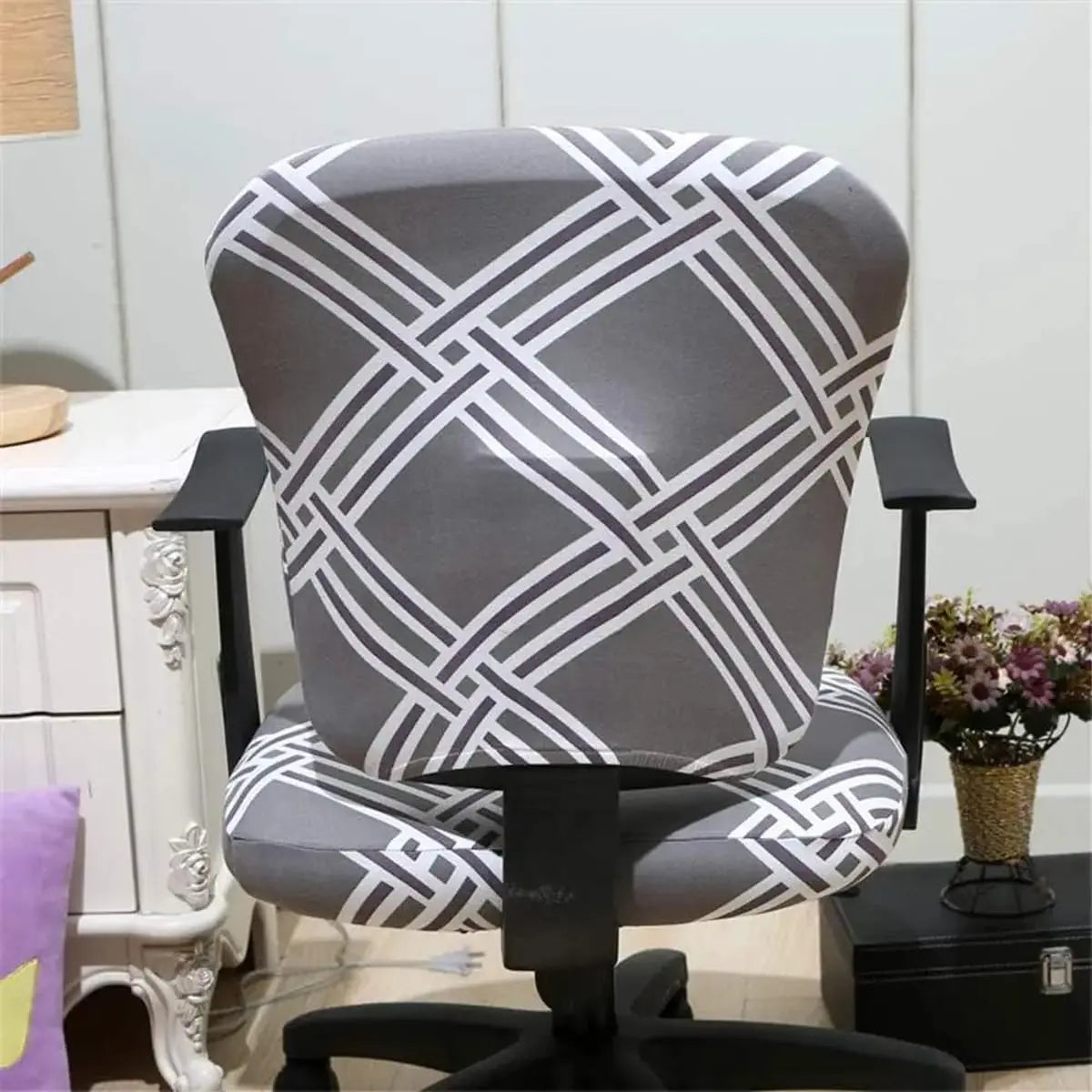 Melaluxe stretchable universal office chair cover for small chairs, in a vibrant color, showing how it fits snugly over the chair.