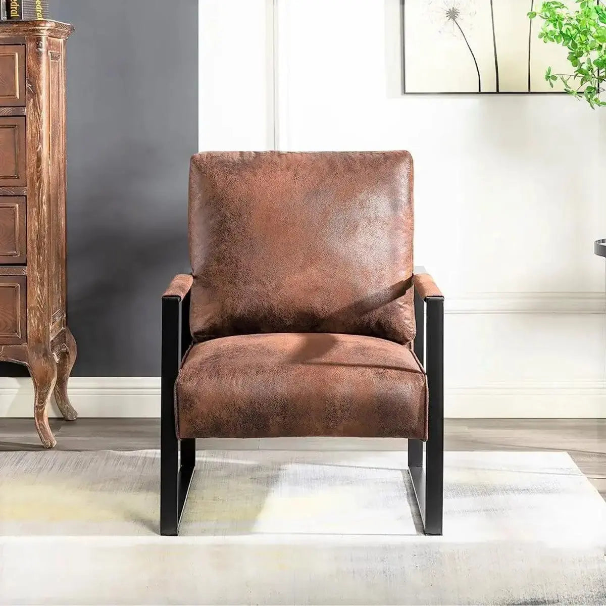 Mid-century modern accent chair with durable brushed metal frame, featuring sleek design and plush upholstery.