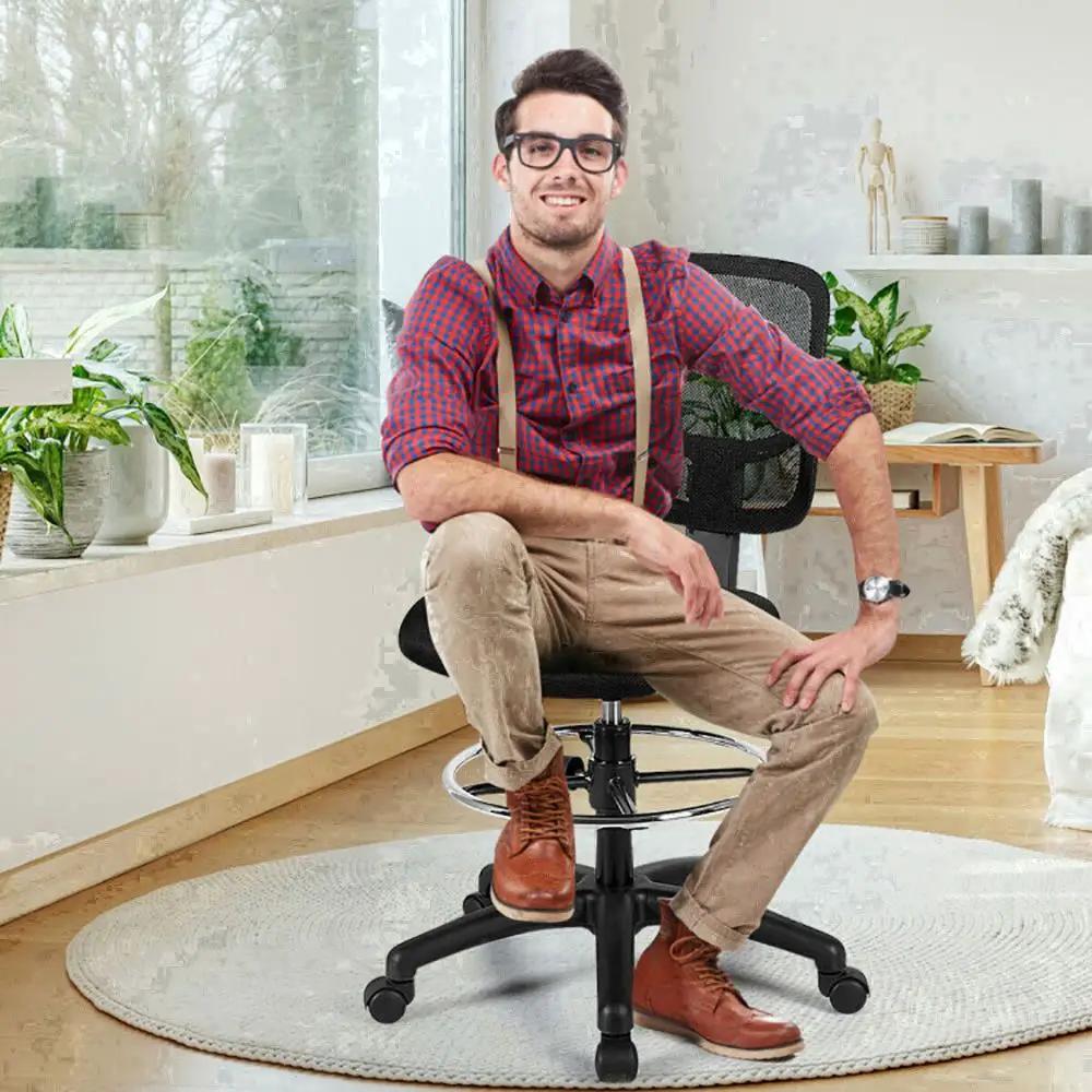 Black ergonomic mesh drafting chair by Platinum-Level Office Chairs with lumbar support, adjustable height, and footrest for comfort.