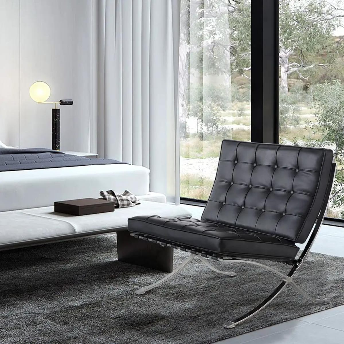 Black foldable lounge chair in Barcelona style with durable frame and non-slip feet, designed for comfortable space-saving seating.