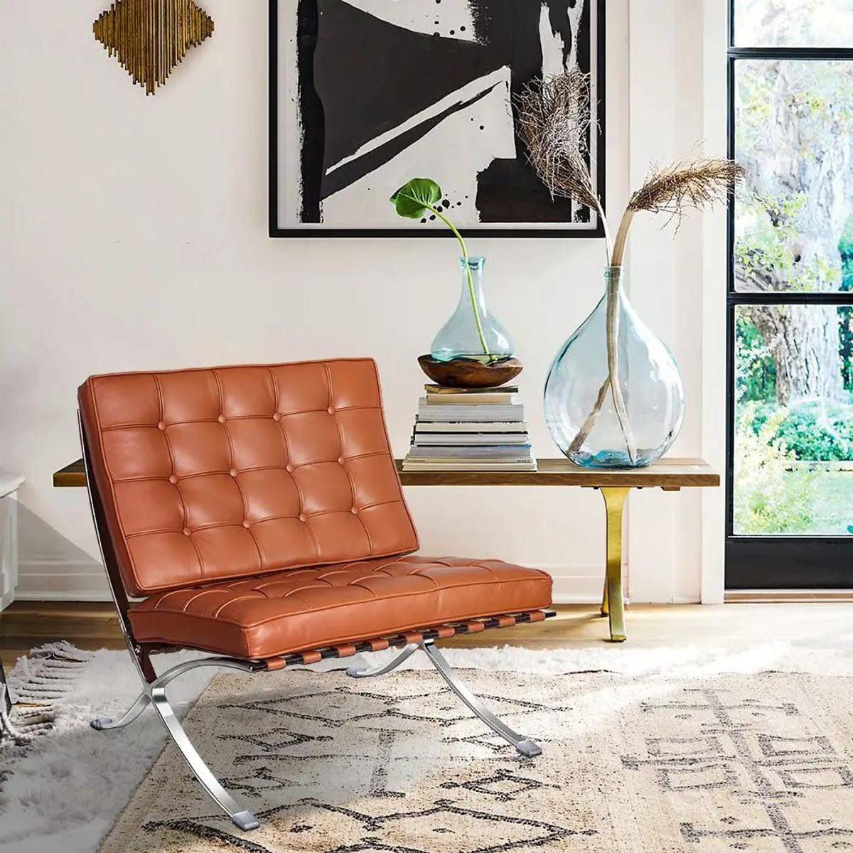 Black foldable lounge chair in Barcelona style with durable frame and non-slip feet, ideal for stylish comfort and space-saving use.