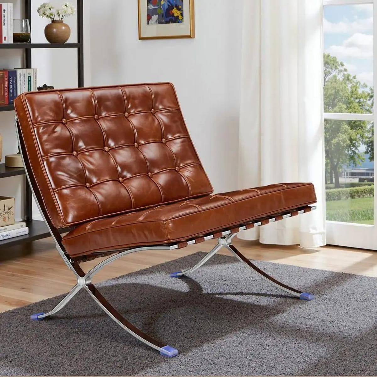 Black foldable lounge chair in Barcelona style by Platinum-Level Office Chairs, featuring durable construction and non-slip feet.