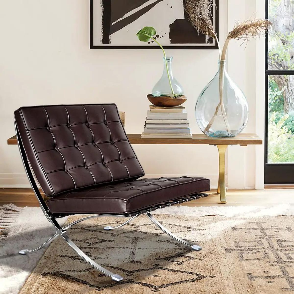 Black foldable lounge chair in Barcelona style with durable frame and non-slip feet, ideal for modern office or lounge spaces.