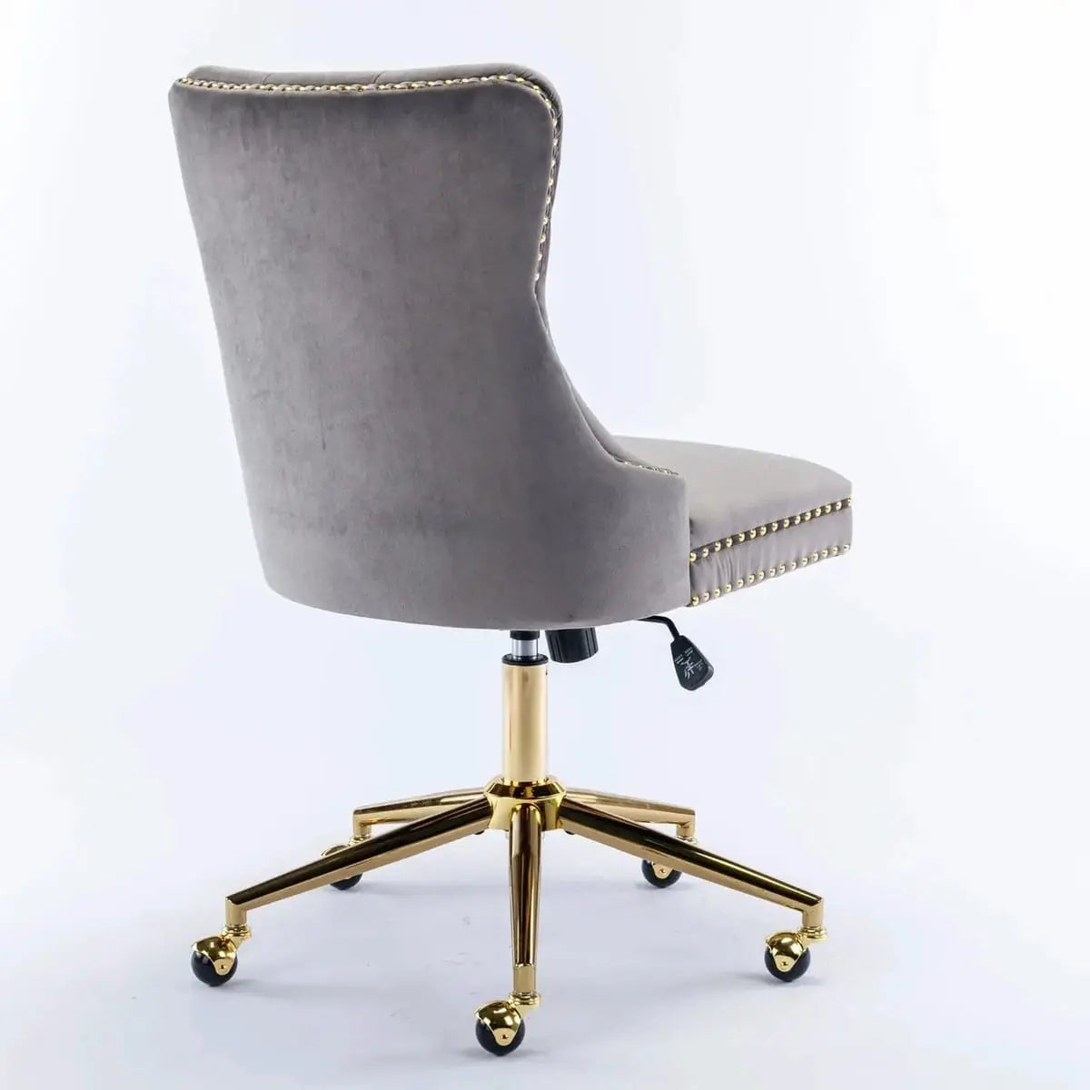 Gray velvet tufted executive office chair with ergonomic foam padding and gold metal base by Platinum-Level Office Chairs.