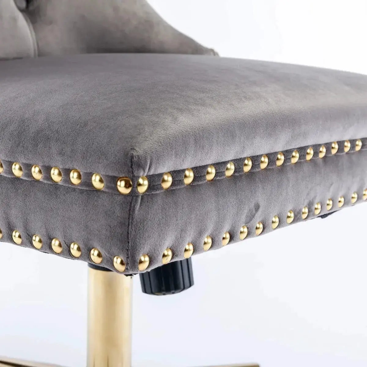 Gray velvet tufted executive office chair with ergonomic foam padding and gold metal base by Platinum-Level Office Chairs