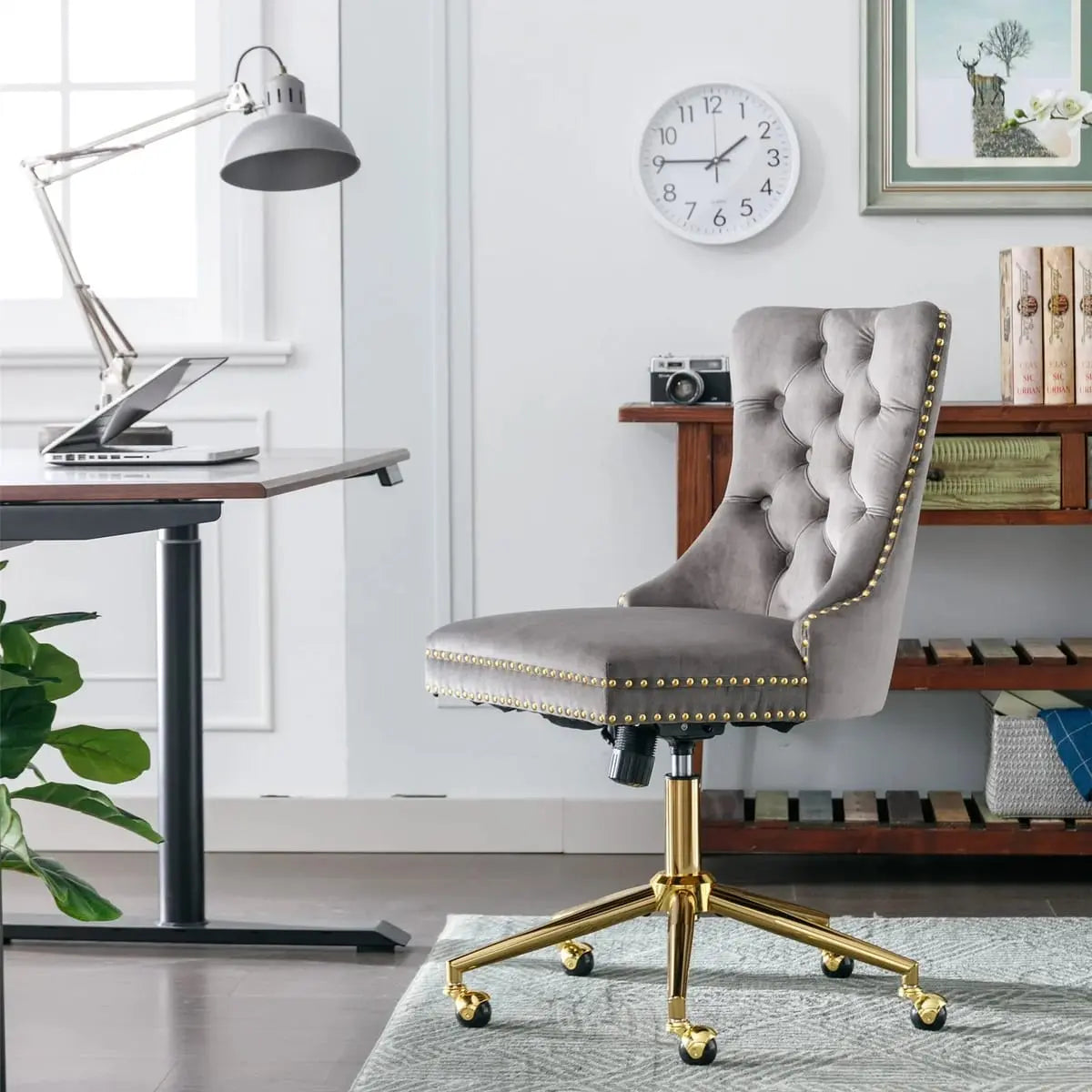 Gray velvet tufted executive office chair with ergonomic foam padding and gold metal base by Platinum-Level Office Chairs.