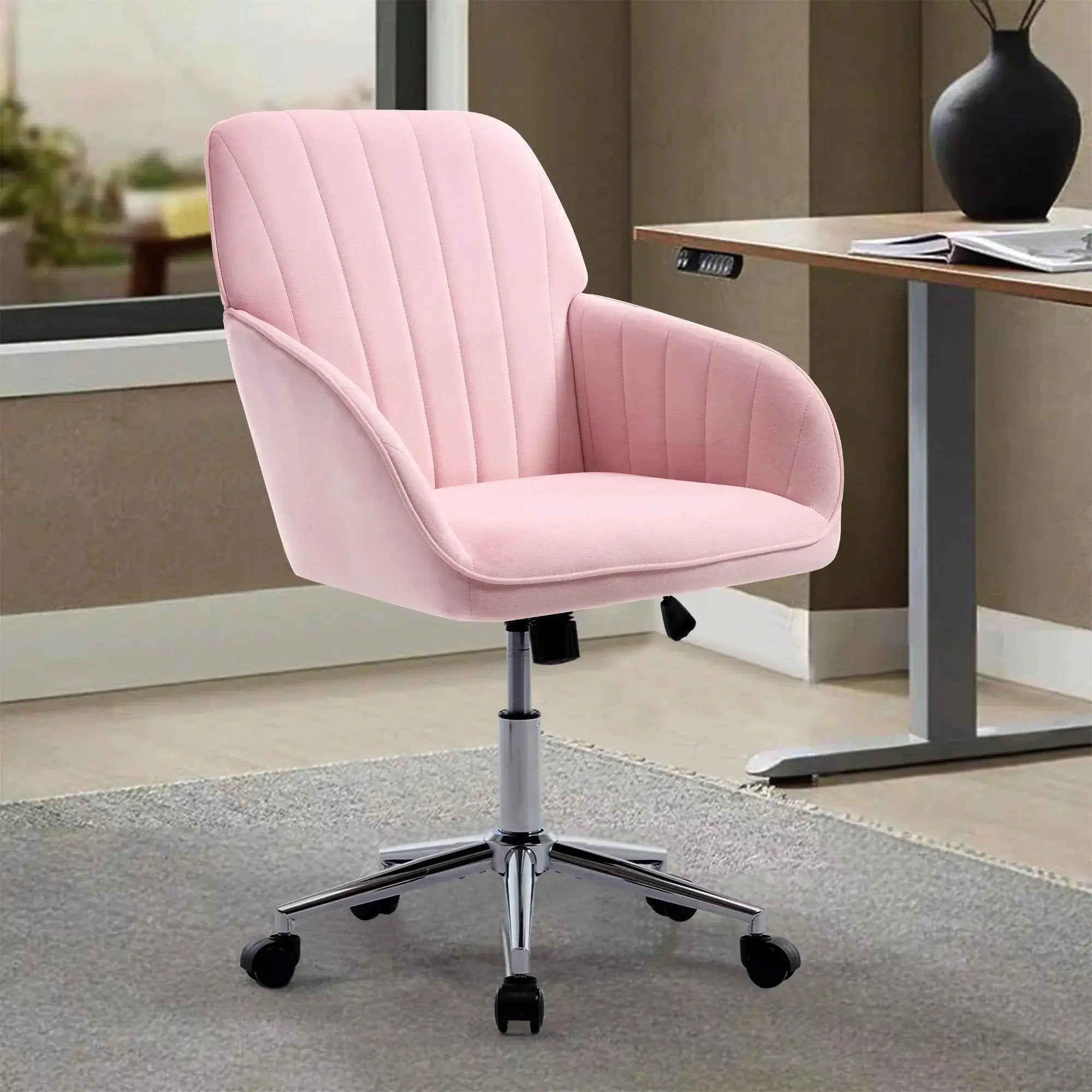 Baby pink velvet ergonomic swivel office chair with adjustable height, lumbar support, and memory foam cushion by Platinum-Level Office Chairs.