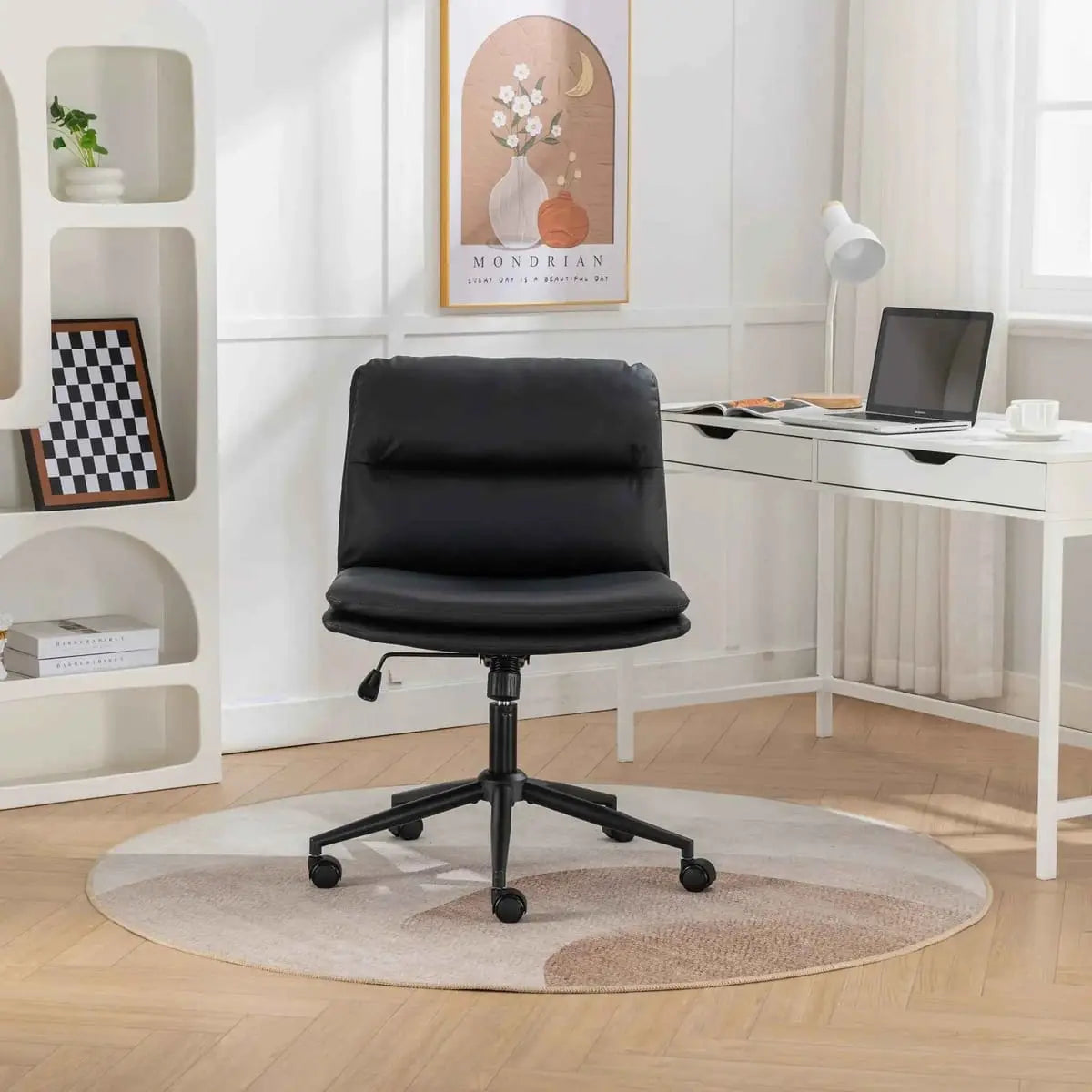 Black Bizerte adjustable swivel office chair with wide ergonomic seat and criss-cross design by Platinum-Level Office Chairs.