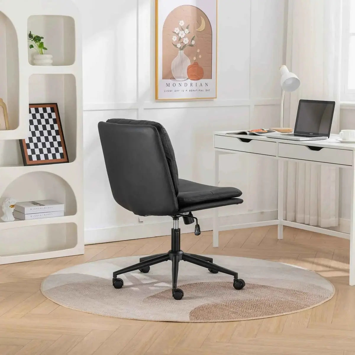 Black Bizerte adjustable swivel chair by Platinum-Level Office Chairs with wide ergonomic seat and criss-cross back design.