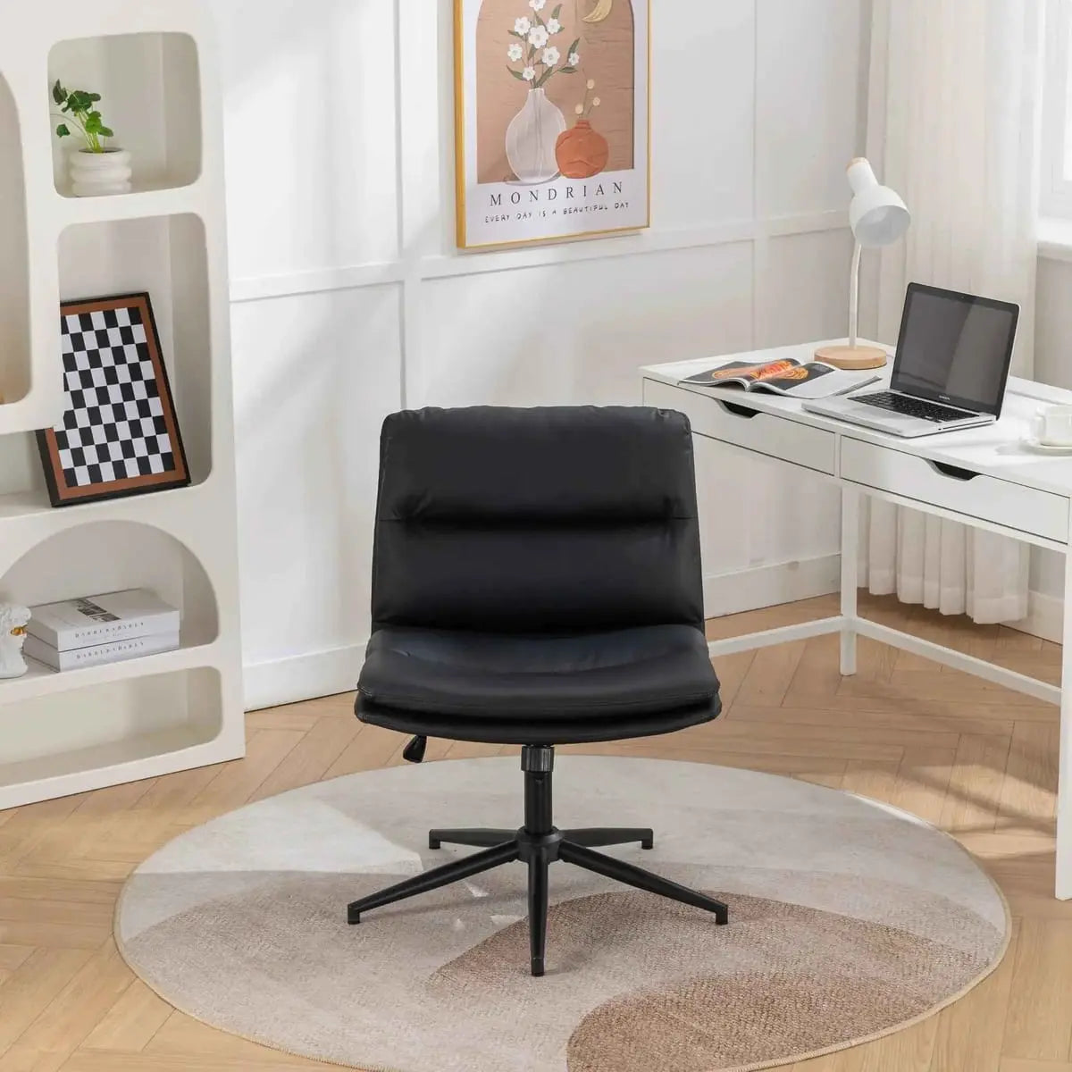 Black Bizerte adjustable swivel chair by Platinum-Level Office Chairs with wide ergonomic seat and criss-cross back design.