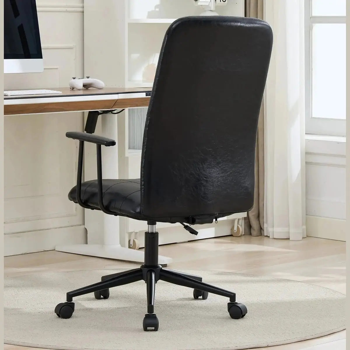 Comfortable antique black PU leather high back office chair with armrests, 360-degree swivel and gas lift from Platinum-Level Office Chairs.