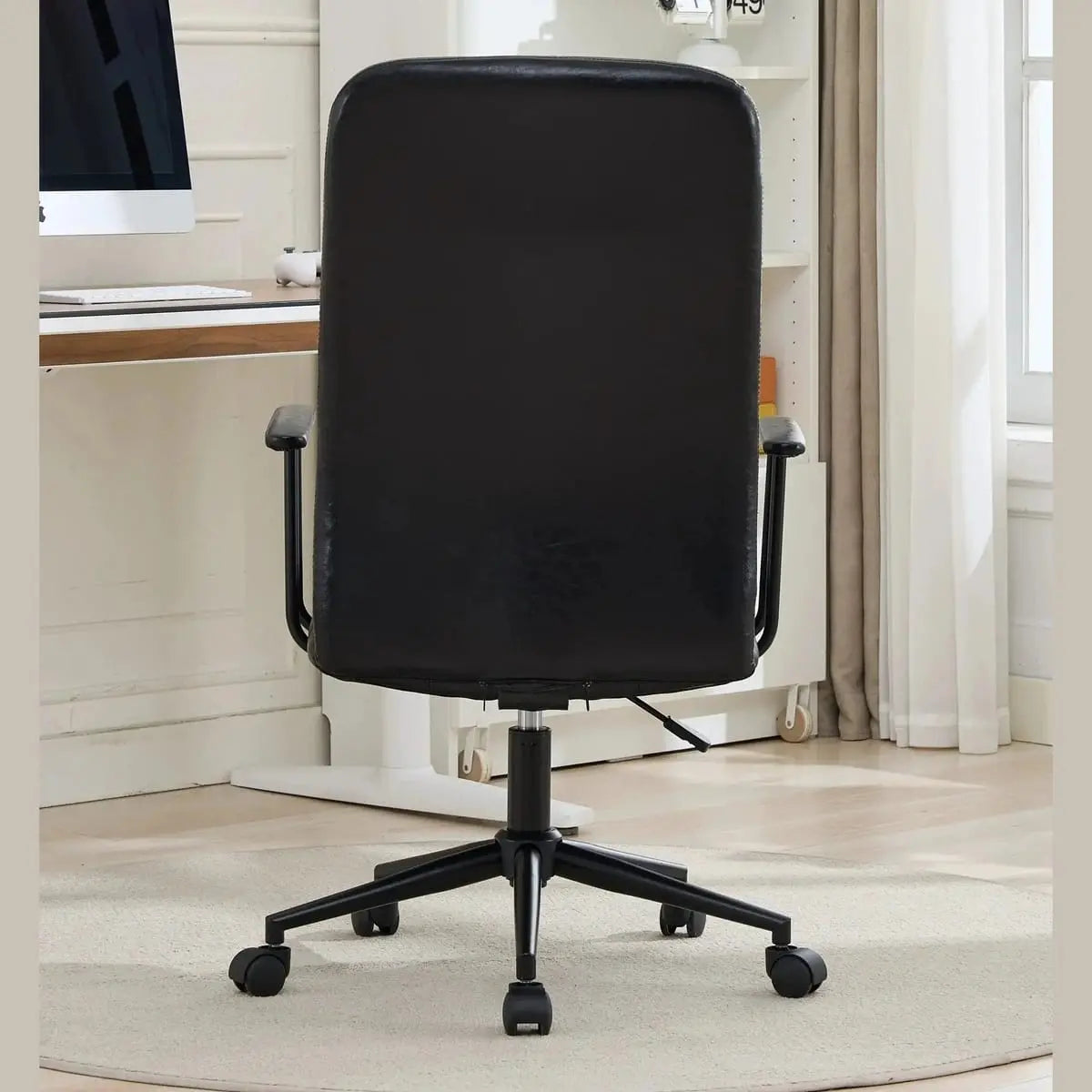 Comfortable antique black PU leather high back office chair with armrests, 360° swivel and gas lift from Platinum-Level Office Chairs.