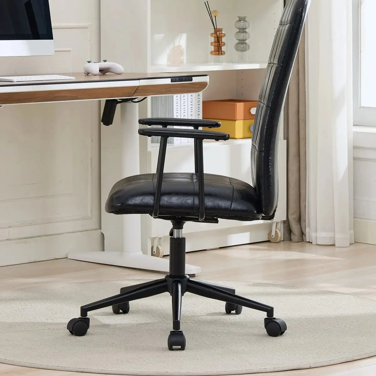 Comfortable antique black PU leather high back office chair with armrests, 360° swivel and gas lift from Platinum-Level Office Chairs.
