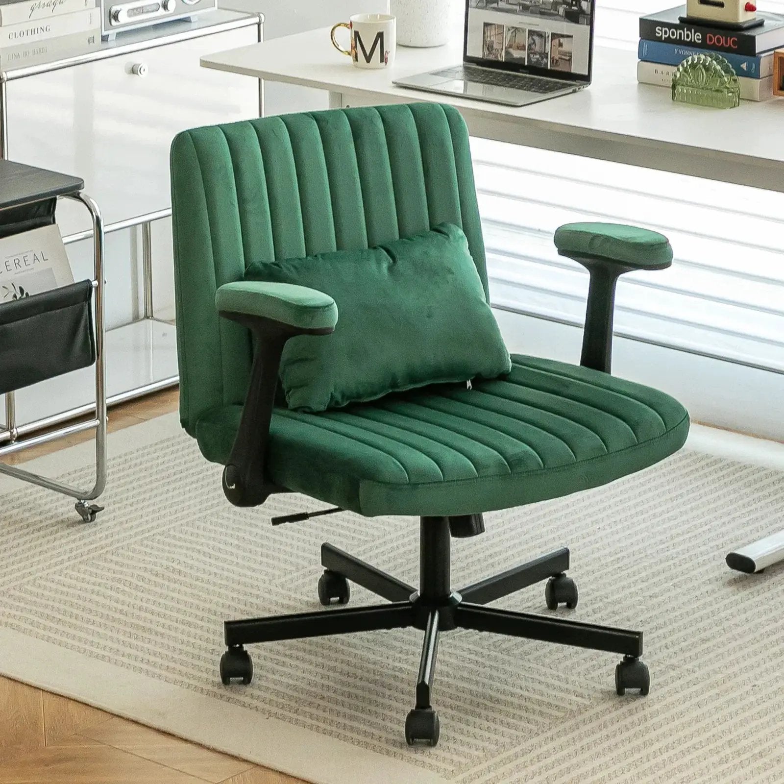 Green velvet office chair by Platinum-Level Office Chairs with criss-cross armrests and memory foam cushioning.