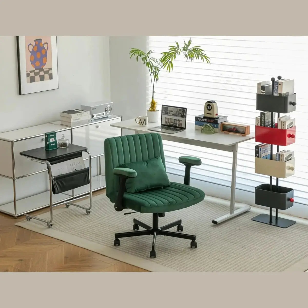 Green velvet office chair with criss-cross armrests and memory foam cushioning by Platinum-Level Office Chairs.