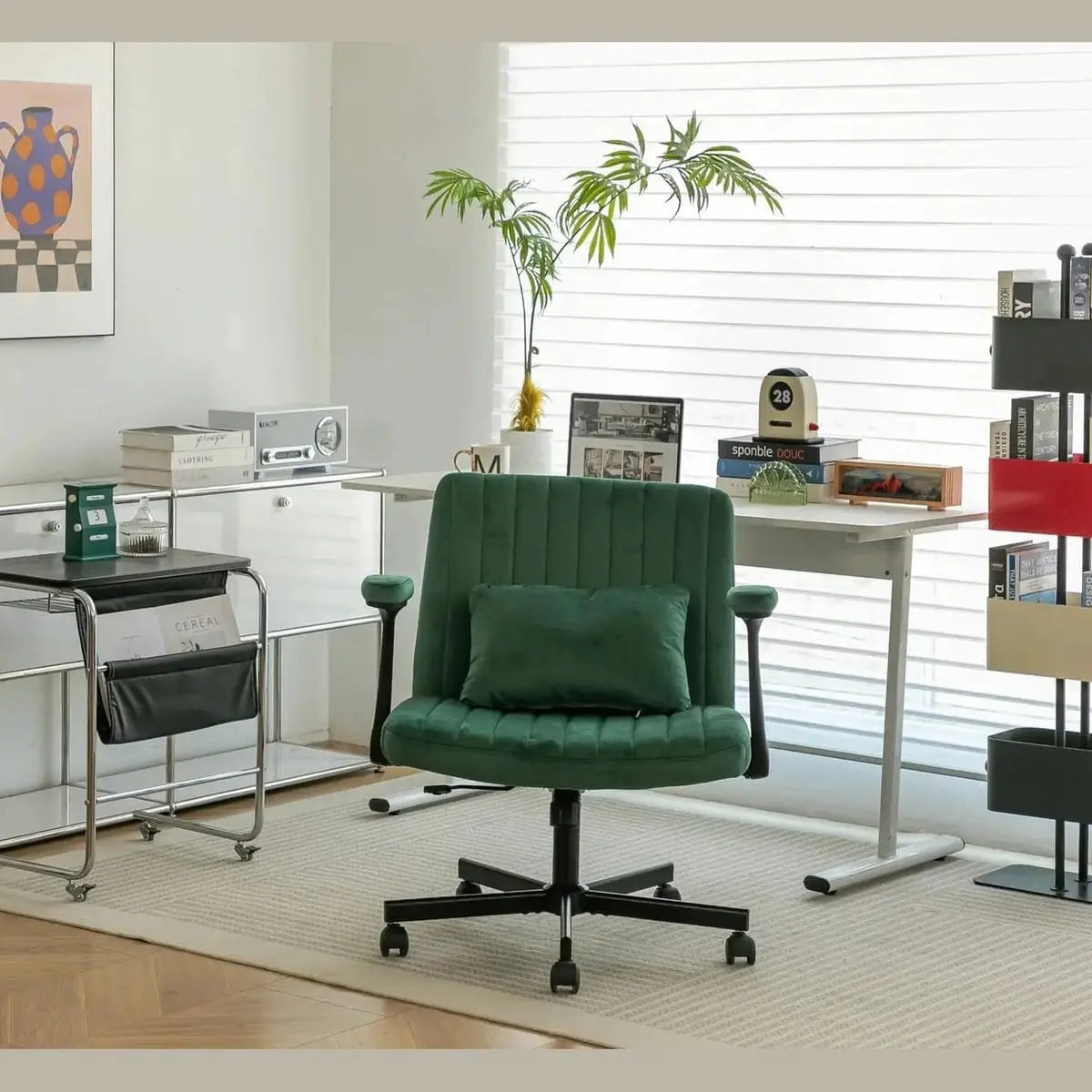 Green velvet office chair by Platinum-Level Office Chairs with criss-cross armrests and memory foam cushioning.