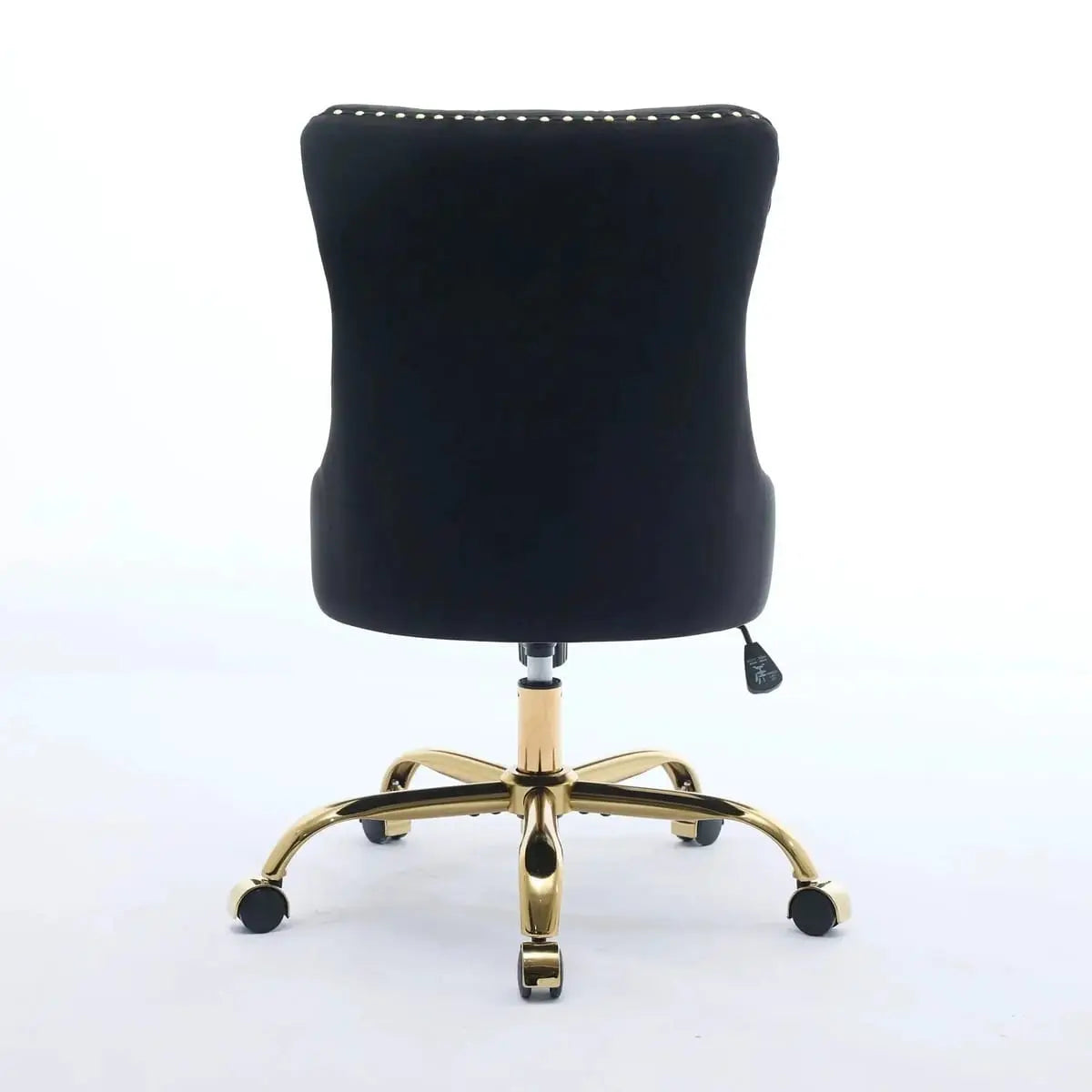Luxurious black velvet tufted office chair with gold electroplated base, deep seating, ergonomic design, and nailhead trim.
