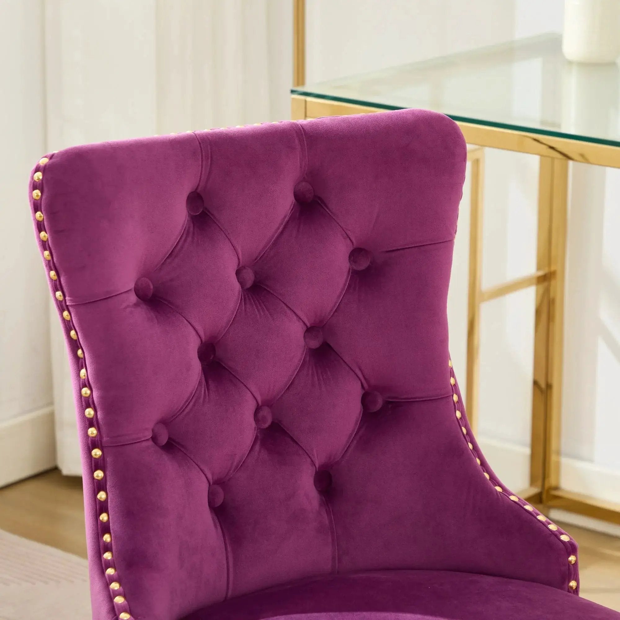 Luxurious purple velvet tufted office chair with golden metal base, nailhead trim, and deep wide seat by Platinum-Level Office Chairs.